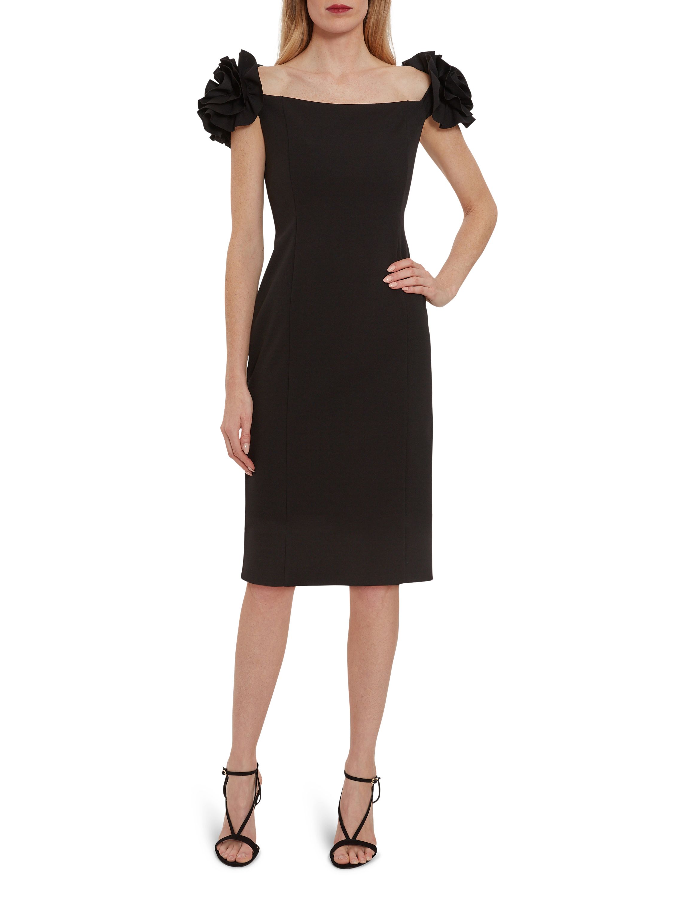 This glamorous stretch crepe dress by Gina Bacconi will make you feel stunning. The off the shoulder neckline with ruffle detailing adds an elegant finish. It is fully lined and fastened with a concealed back zip. Perfect for a party or a special occasion.