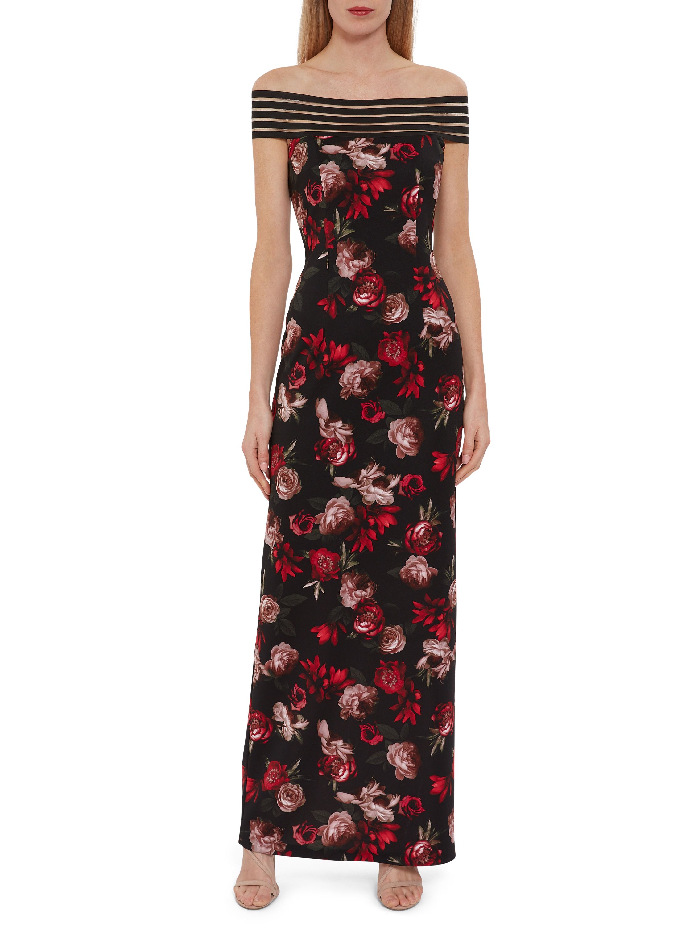 Look no further for that smart party outfit with this gorgeous maxi dress by Gina Bacconi. This dress is fashioned from a beautiful floral scuba. Fitted at the bodice, the dress features a modern off the shoulder stretch band. This is a staple for your wardrobe this season: elegant, comfortable and versatile.