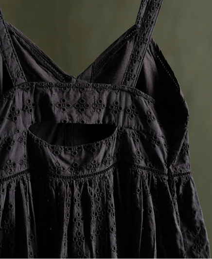 Superdry women's Daisy midi dress. This dress features a sweet heart neckline, two straps, button fastenings and a frill hemline. Complete with a cut out back and metal Superdry logo badge on the waistline. Style with your favourite sandals this season.