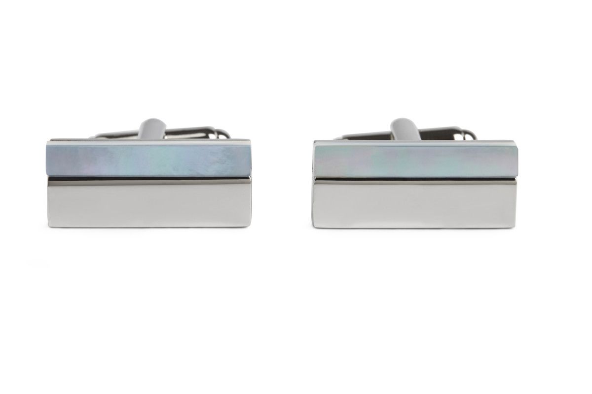 A strip of Blue Mother of Pearl rests on a polished imitation Rhodium plated base for this cufflink.