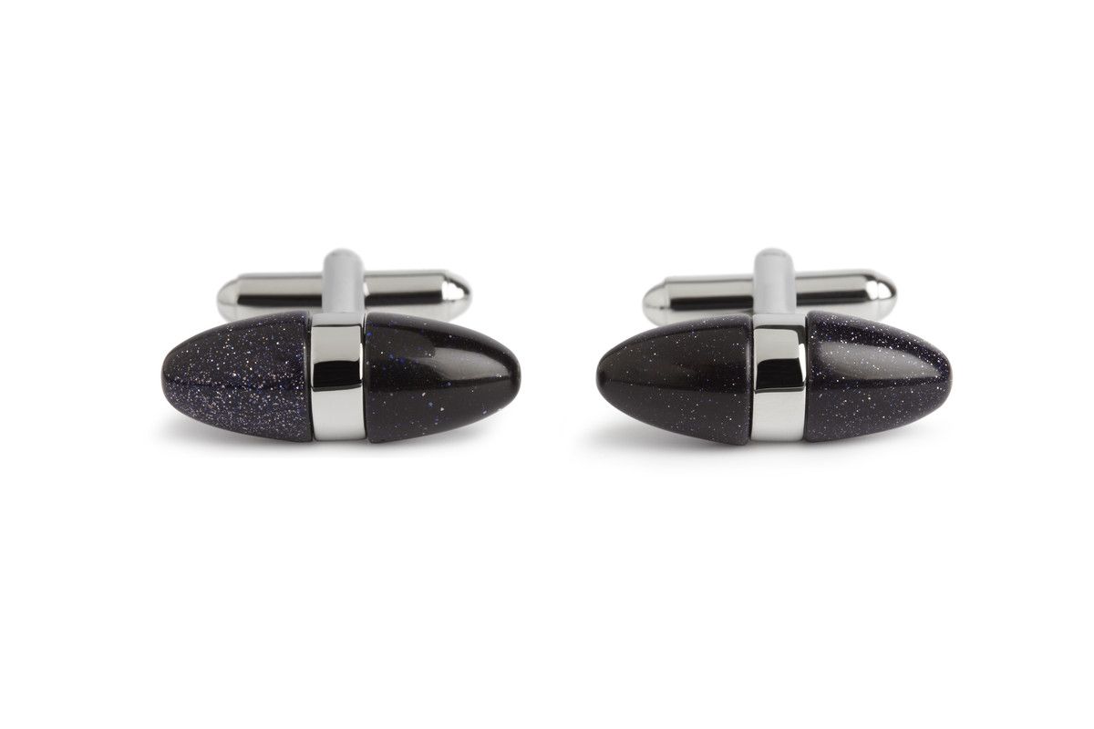 This egg design cufflink has been made with blue goldstone, a man made stone it's sparkle comes from flecks of copper and is said to be an uplifting stone promoting a positive attitude.