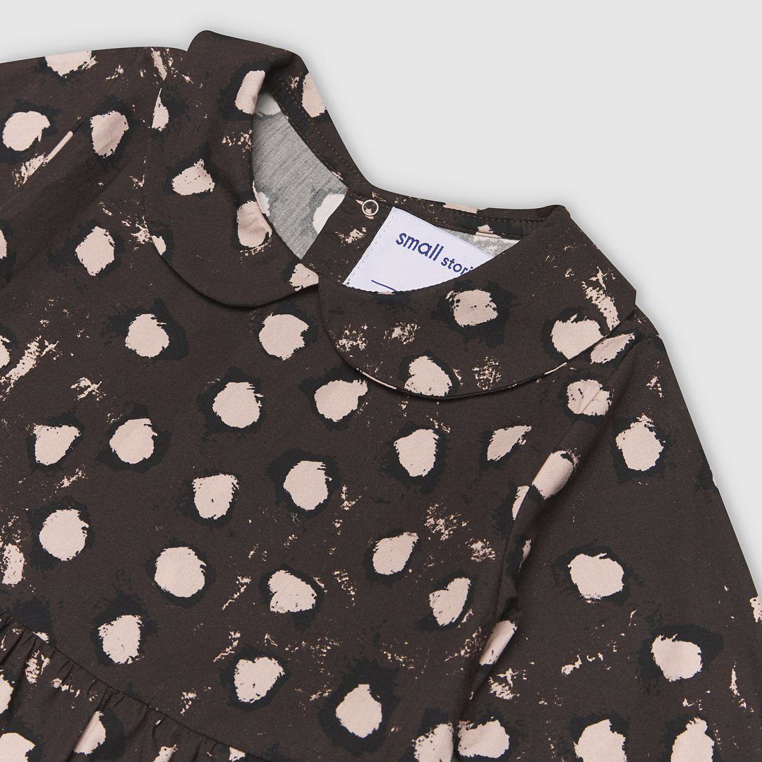 Lightweight 100% cotton dress with our bespoke painted dot print in brown with pink and black dots. Features a Peter Pan Collar and press stud back opening for ease of dressing.