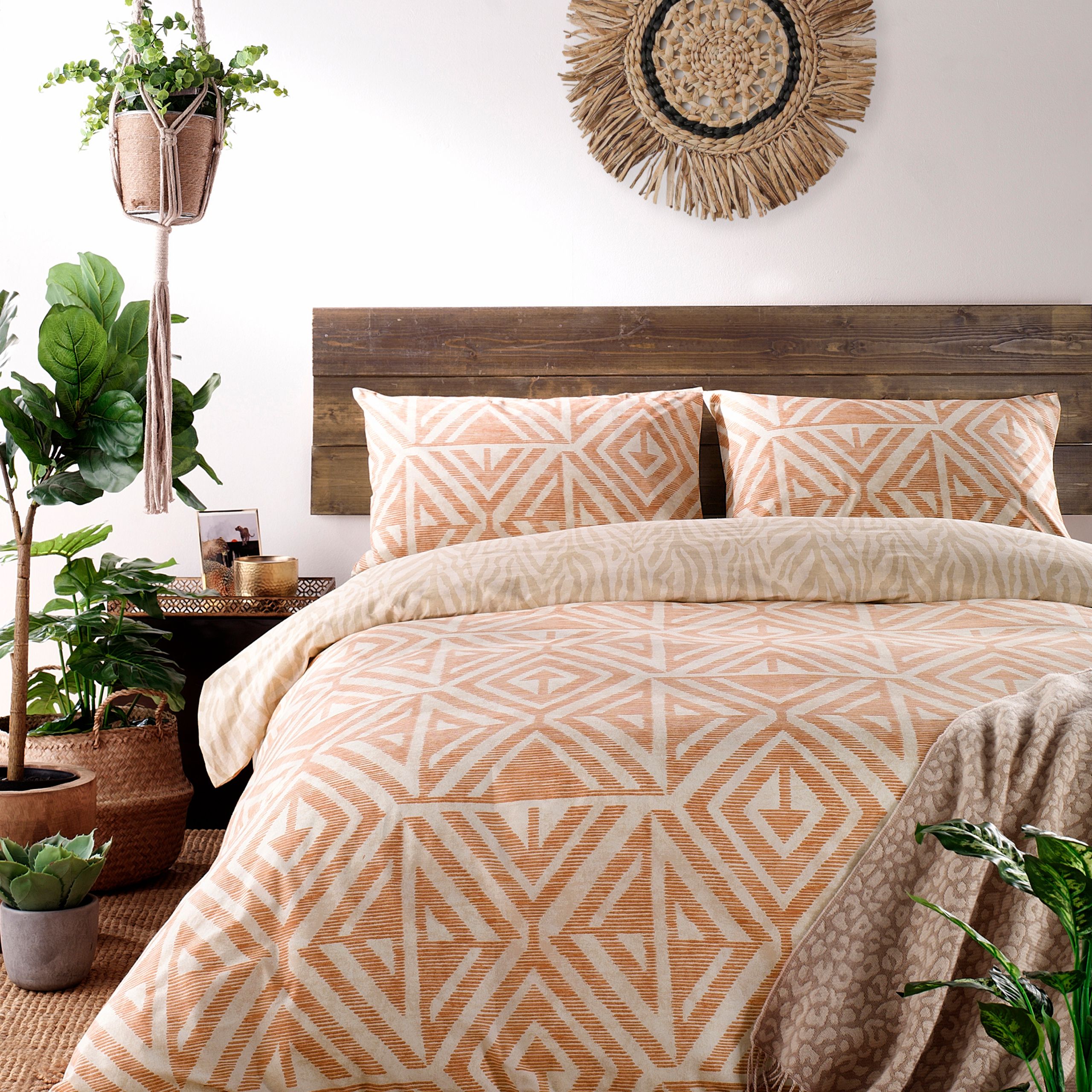 A soft, global-inspired geometric print duvet set and pillow cases - perfect for adding texture and warmth to your bedroom. Featuring a tonal animal print reverse print, for a softer alternative when you need it.