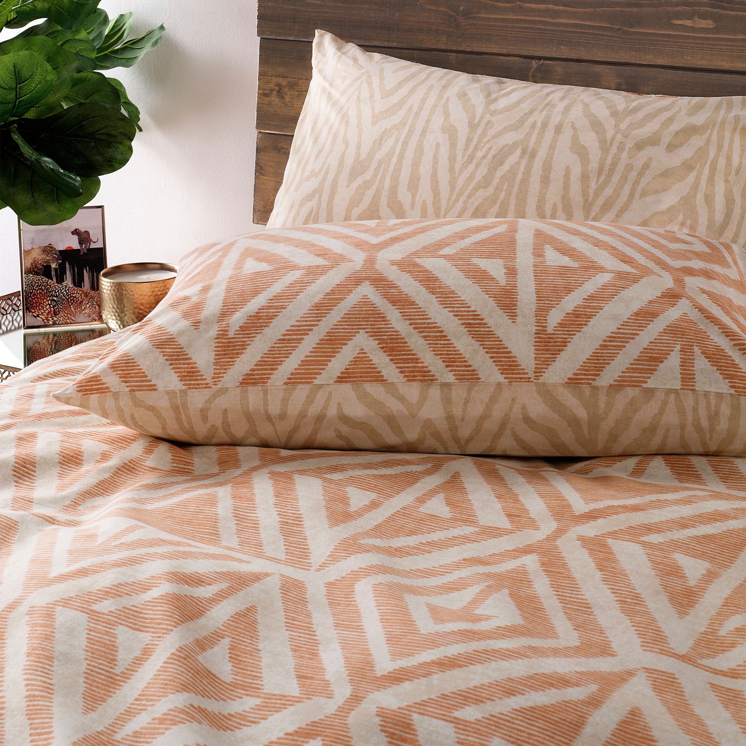 A soft, global-inspired geometric print duvet set and pillow cases - perfect for adding texture and warmth to your bedroom. Featuring a tonal animal print reverse print, for a softer alternative when you need it.