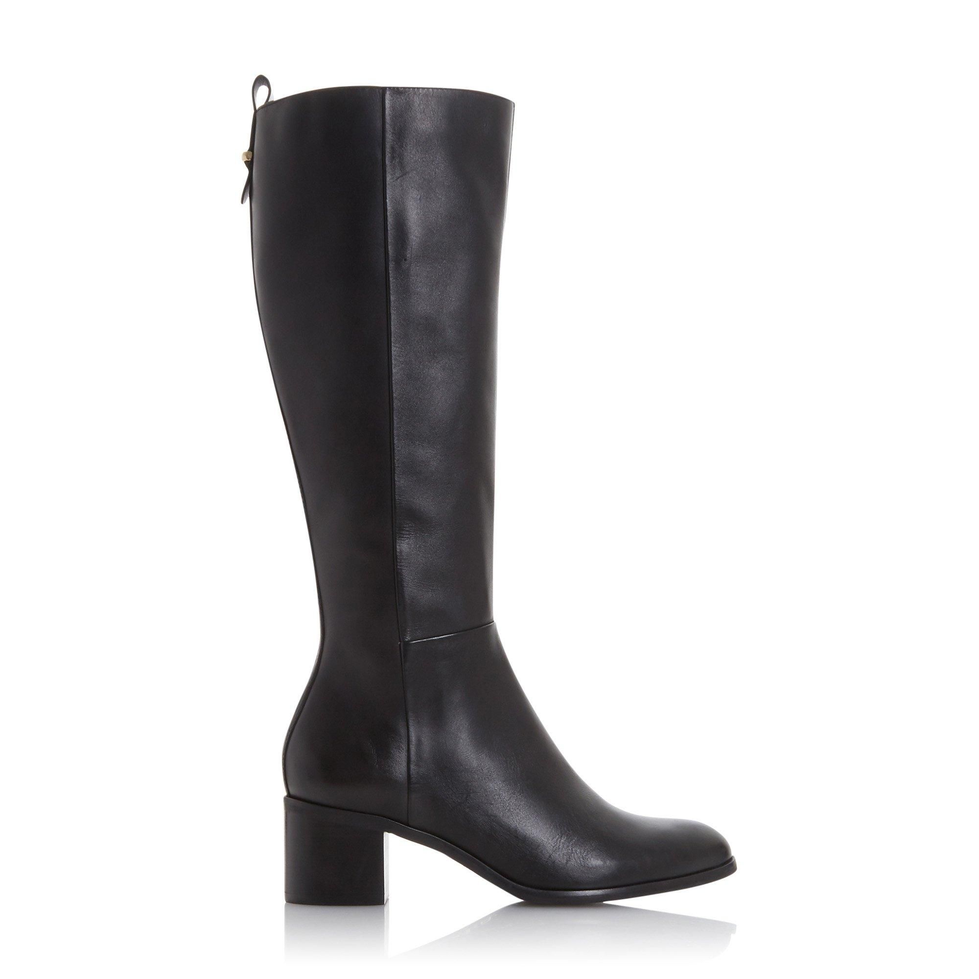 This classic knee-high boot is simple and sophisticated. Featuring an almond toe, side zip fastening and back pull up tab. Complete with a medium block heel.
