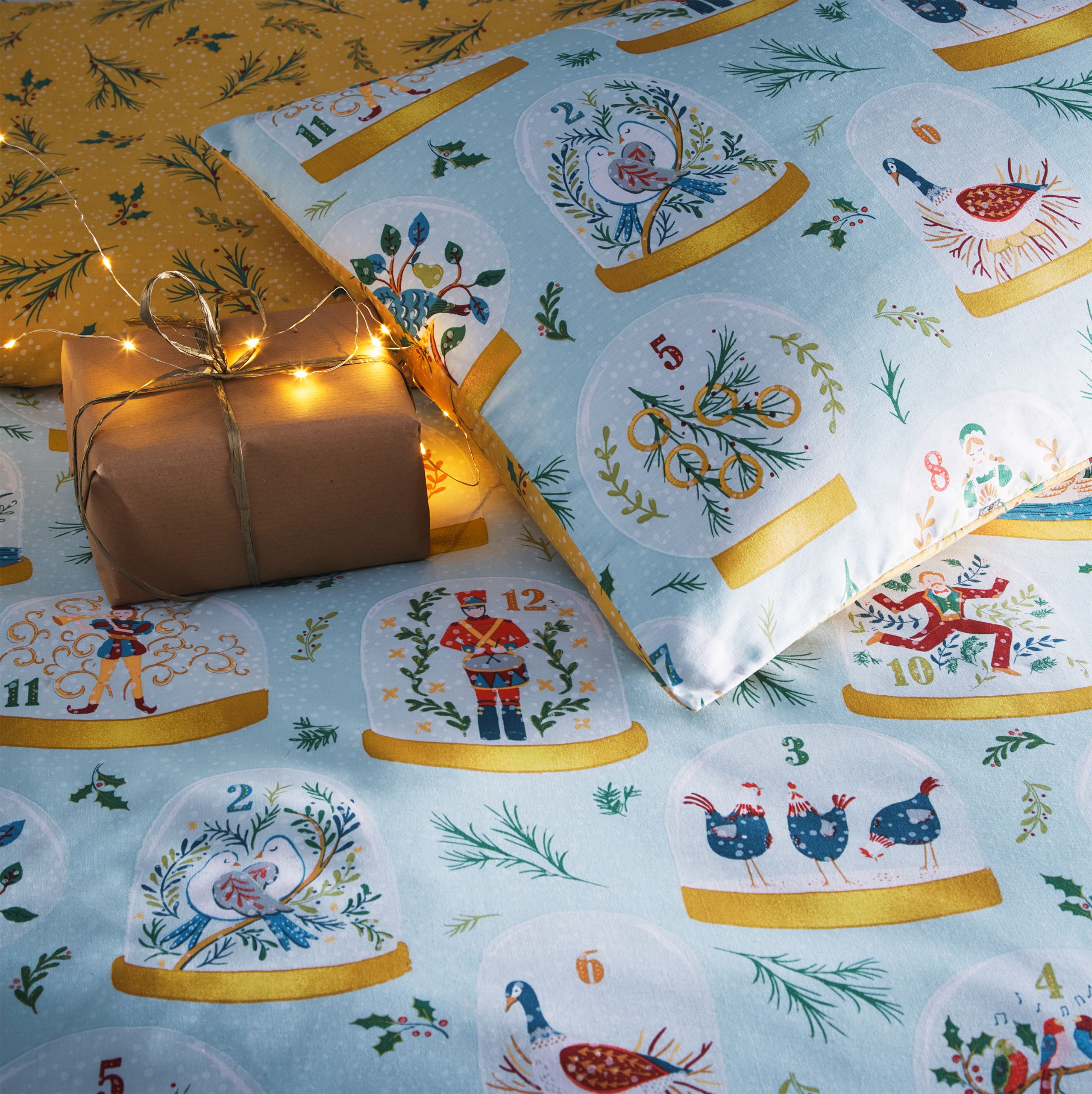 In celebration of the traditional Christmas song, our 12 days of Christmas bedding is a festive feast for the eyes, depicting each of the gifts within a ornate snow globe, for a magical touch. The reverse design features festive sprays of pine and holly, and a dusting of snow.