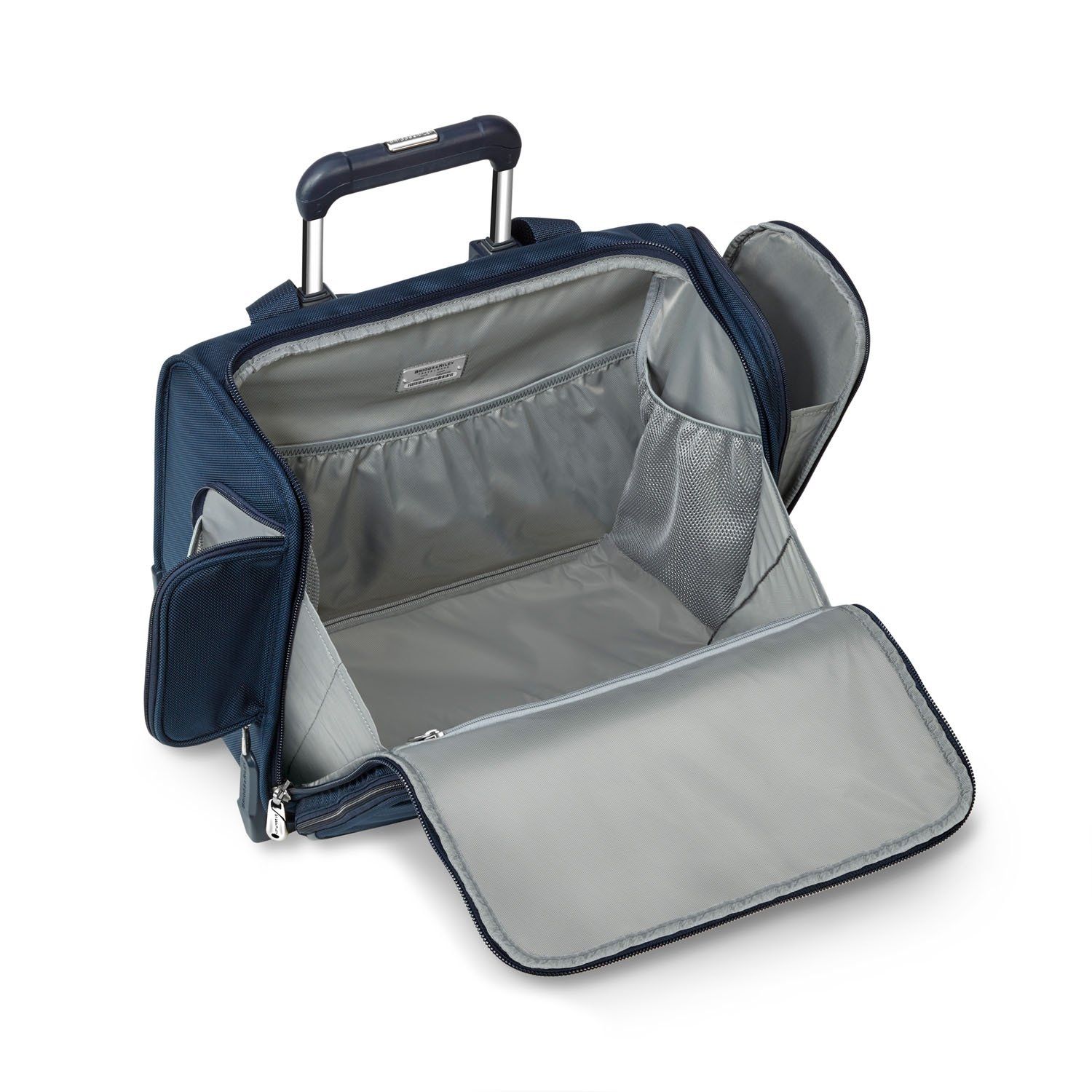 The ideal luggage to carry on board, this wheeled cabin bag keeps you organised with every turn. Fits under most airline seats as well as in the overhead compartment. Key features include: Padded pocket for iPad®. Roomy, gusseted main compartment allows bag to be easily packed and organised. Three elastic mesh pockets provide additional organisation for smaller items like belts and other accessories. Interlocking handle system allows bag to stack and stay secure on top of other Briggs & Riley Baseline Uprights®. Outsider® handle provides greater interior capacity and a flat interior surface for packing so clothing arrives wrinkle-free. Side water bottle zipper pocket for easy access to beverage.