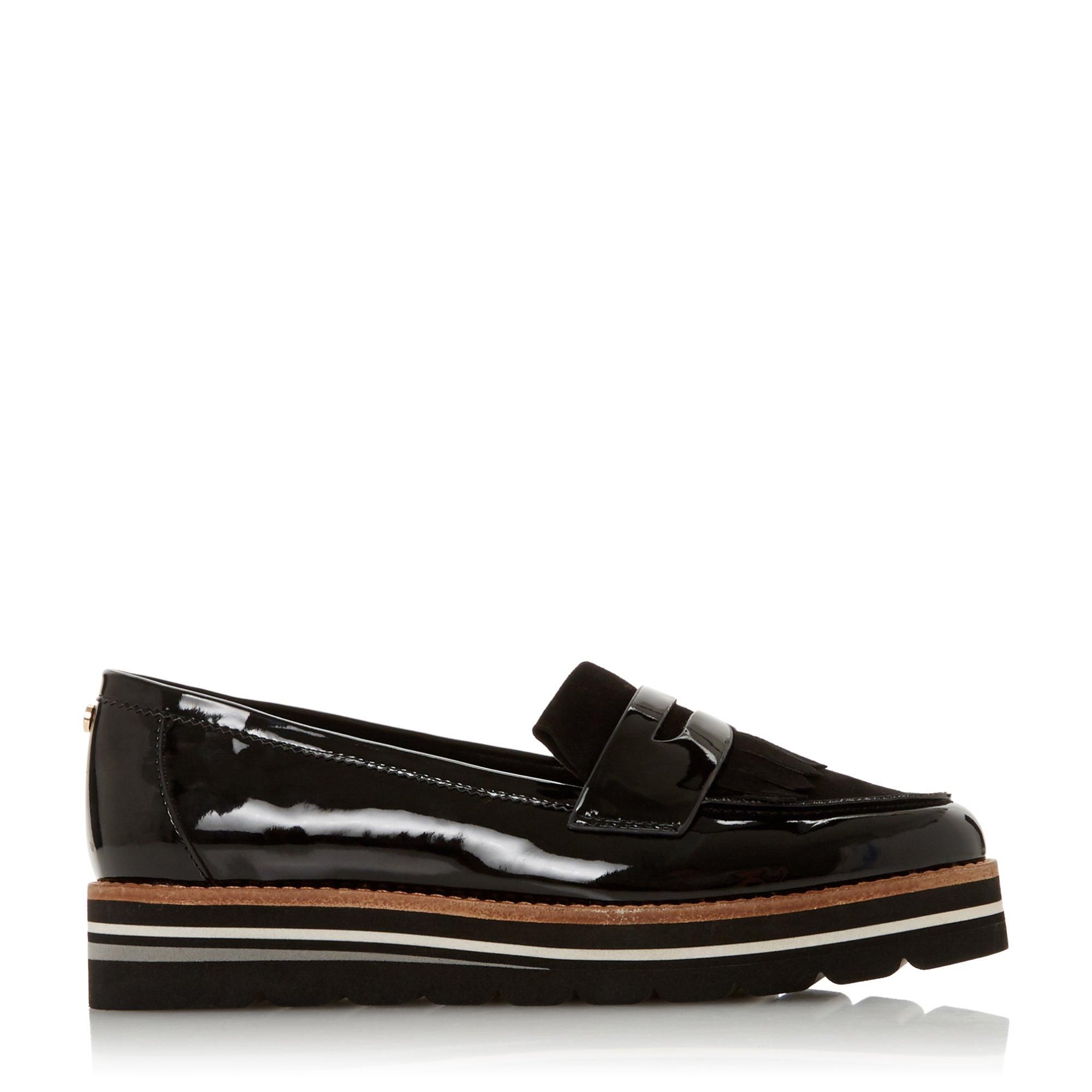 Create chic daytime looks with the Gracella loafer from Dune London. Resting on a flatform heel, it features smart apron detailing. It is complete with a fringed trim and a timeless saddle strap.
