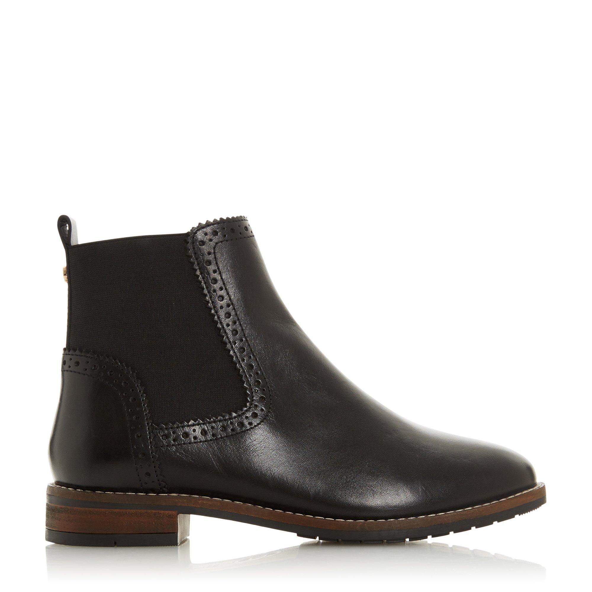 The Quant boot from Dune London is a combination of classic and modern. sty. Trimmed with brogue-inspired detailing on the elasticated side panel.. It's made from premium leather and features a pull tab on the back.