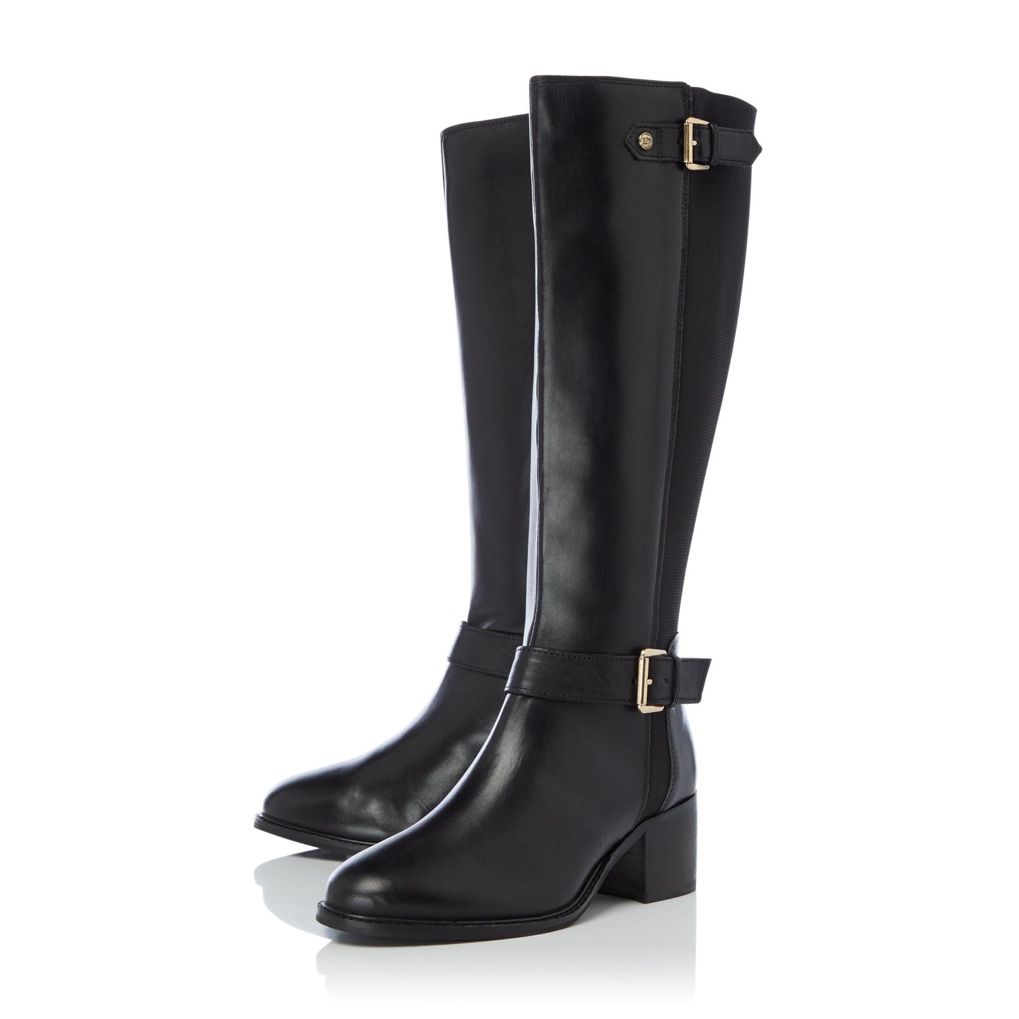 Get ready for winter with Dune London's wide fit Tildas boots. They're cut to a calf length and detailed with metallic buckles. A low block heel completes the design.