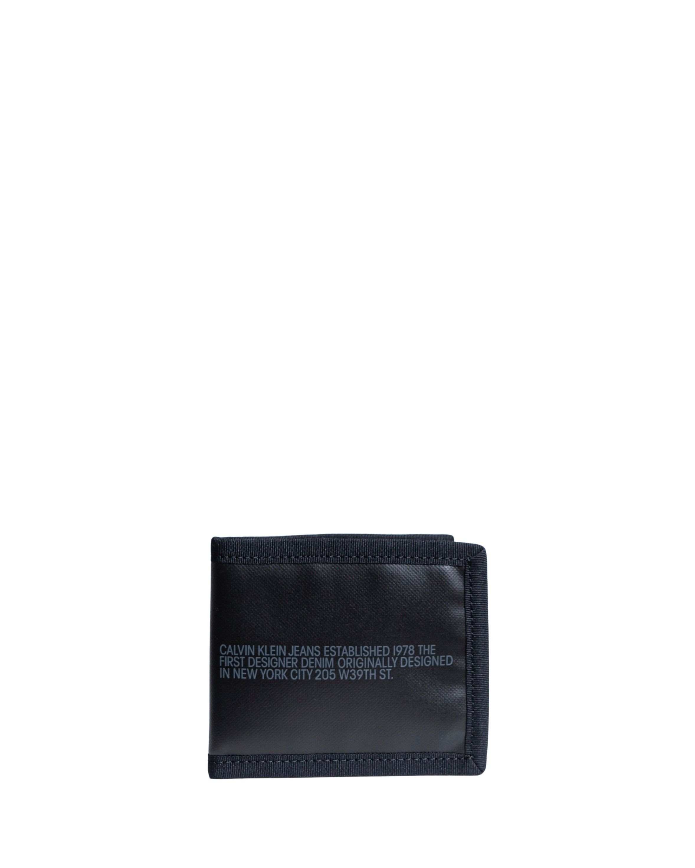 <b>Brand:</b> Calvin Klein<br><b>Gender:</b> Men<br><b>Type:</b> Wallets<br><b>Season:</b> Fall/Winter<br><br><b>PRODUCT DETAIL</b><br>• <b>Color:</b> black<br>• <b>Pattern:</b> print<br><br><b>COMPOSITION AND MATERIAL</b><br>• <b>Composition:</b> -100% polyester
