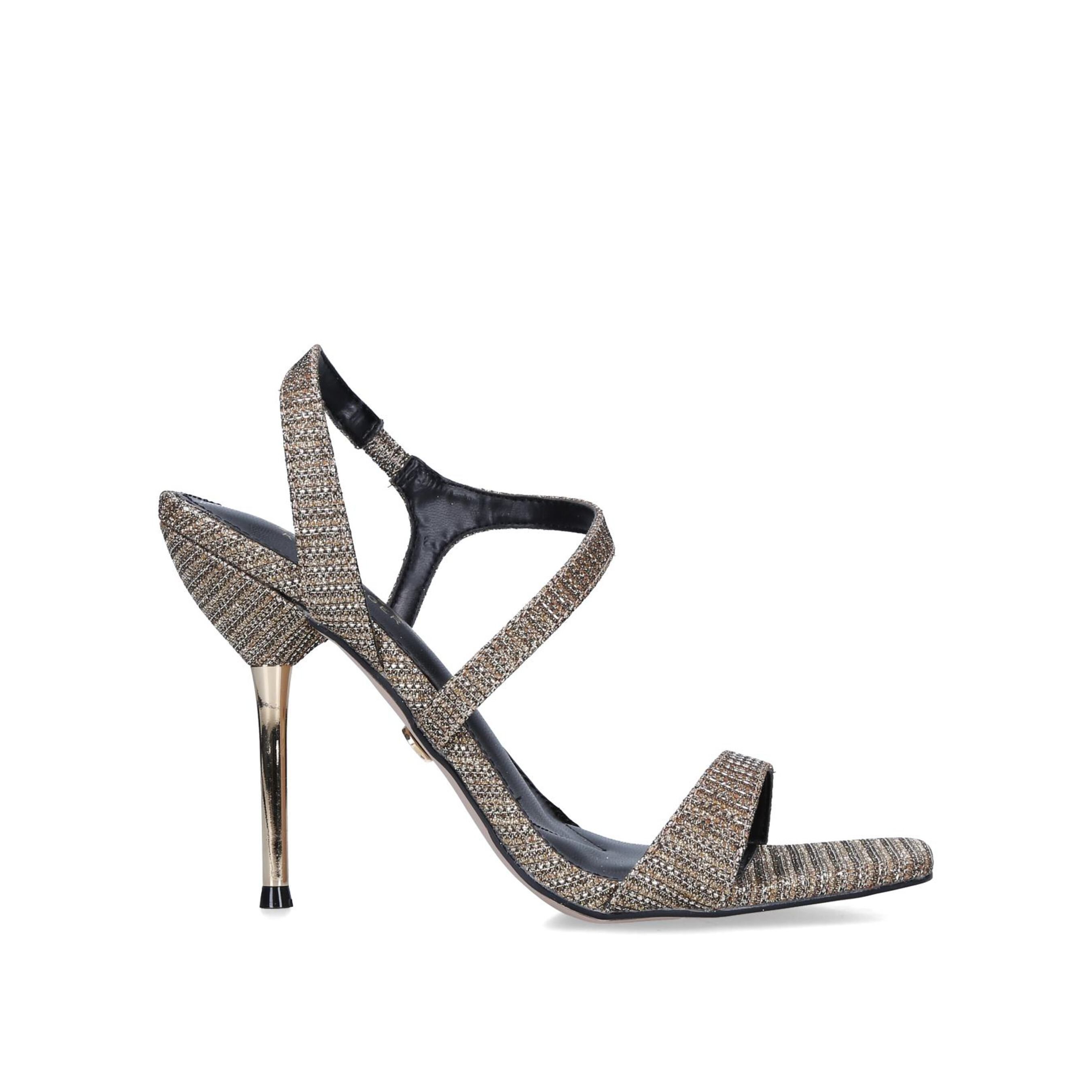 The Priya heels from Miss KG in gold lizard print add a sophisticated addition to any shoe collection, their black upper elongates the leg.