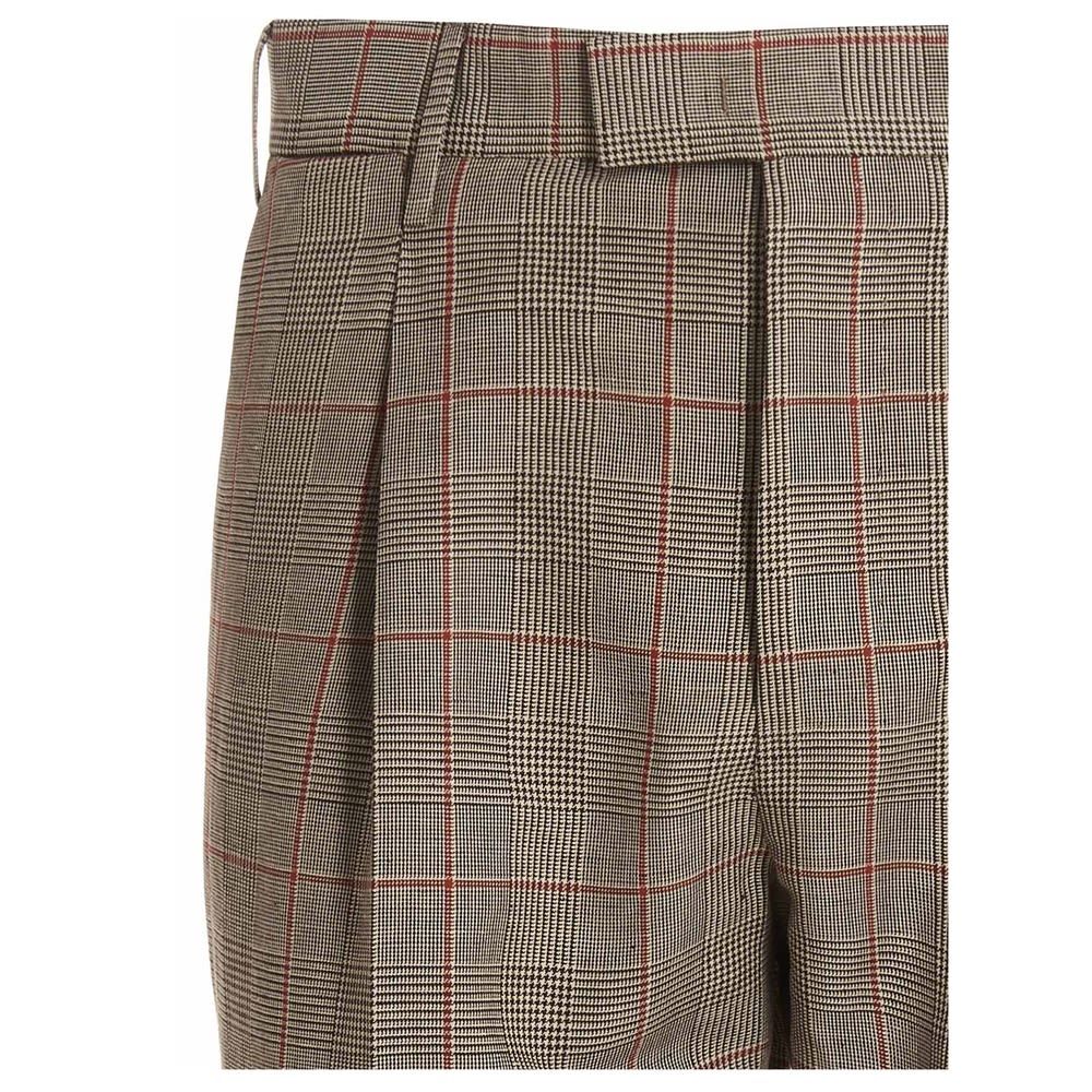 'Flicker' trousers in a check patterned fabric featuring turn ups.