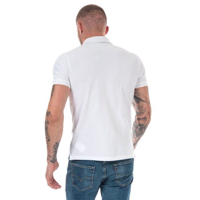 Mens Timberland Millers River Jacquard Polo Shirt in white.<BR><BR>- Ribbed polo collar.<BR>- Jacquard stripe detail with print branding under the collar.<BR>- Two button placket.<BR>- Short sleeves with ribbed cuffs.<BR>- Even vented hem.<BR>- Contrast back neck tape.<BR>- Signature Timberland logo embroidered at left chest.<BR>- Soft and comfortable organic cotton piqué fabric.<BR>- Slim fit.<BR>- Measurement from shoulder to hem: 27“ approximately.<BR>- 100% Organic cotton.  Machine washable.<BR>- Ref: TB0A1YQ9 100<BR><BR>Measurements are intended for guidance only.