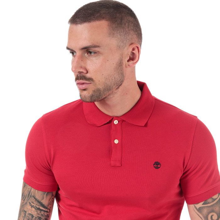Mens Timberland Millers River Jacquard Polo Shirt in red.<BR><BR>- Ribbed polo collar.<BR>- Jacquard stripe detail with print branding under the collar.<BR>- Two button placket.<BR>- Short sleeves with ribbed cuffs.<BR>- Even vented hem.<BR>- Contrast back neck tape.<BR>- Signature Timberland logo embroidered at left chest.<BR>- Soft and comfortable organic cotton piqué fabric.<BR>- Slim fit.<BR>- Measurement from shoulder to hem: 27“ approximately.<BR>- 100% Organic cotton.  Machine washable.<BR>- Ref: TB0A1YQ9 P92<BR><BR>Measurements are intended for guidance only.