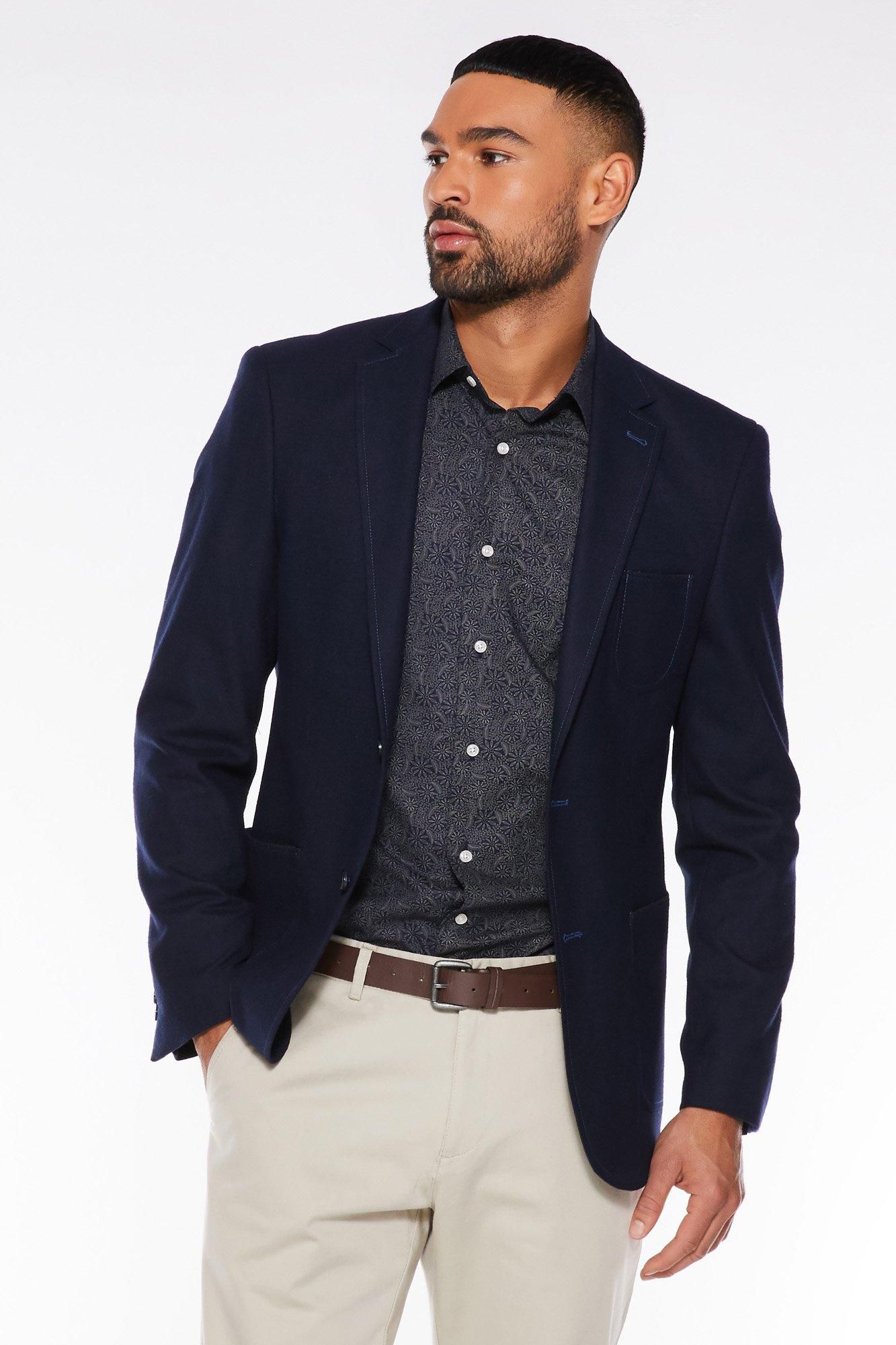 Navy Soft Touch Fabric  	Double Button Fastening  	Double Vented Back  	Functional Side Patch Pockets and Breast Pocket  	Lined with Internal Pocket  	Notch Lapel