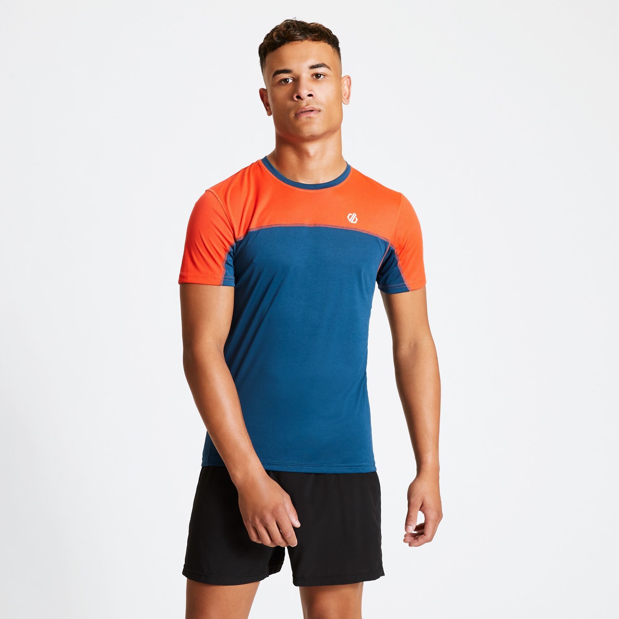 Material: 100% Polyester (Q-Wic lightweight polyester fabric).   Soft, lightweight and form fitting short sleeved t-shirt. Ideal warm-weather companion for jogging, squat-jumping or hiking. Features a mesh panel across the shoulders. Reflective Dare 2B logo detail.