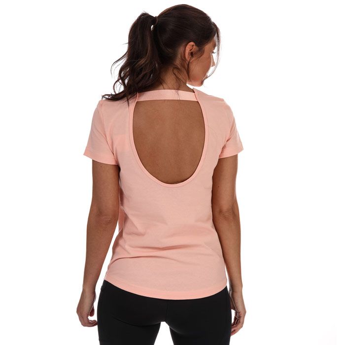 Womens adidas Motion T- shirt in pink.- Crew neck.- Short sleeves.- Deep back cutout.- Soft and lightweight.- Sweat-wicking Climalite fabric.- FreeLift pattern for overhead movement.- Slim fit.- 70% Cotton  30% Polyester (Recycled) . Machine washable.- Ref: EH6470