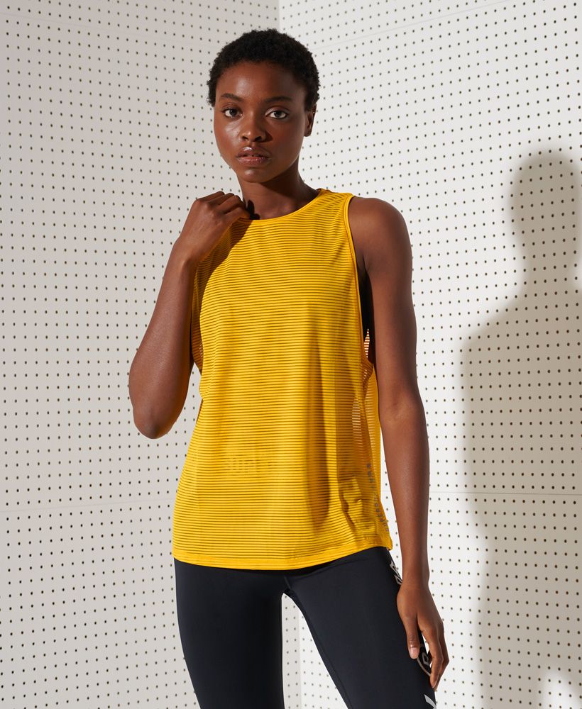 Part of our Training range, the Training Mesh Tank Top is made from a lightweight mesh material designed to keep you cool during your workouts this season. Style with your favourite gym leggings and trainers to complete this look.Relaxed: A classic fit. Not too slim, not too tight – no distractions hereTwo double shoulder strapsStriped mesh materialLoose arm holesReflective Superdry logo
