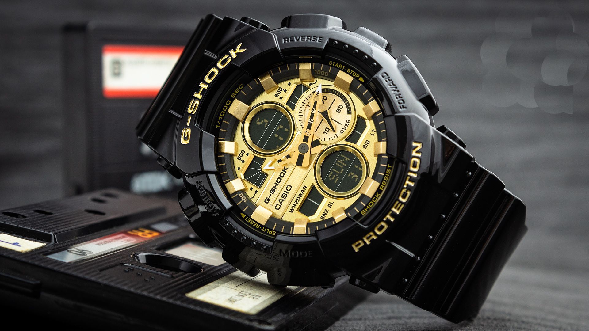 This Casio G-shock Analogue-Digital Watch for Men is the perfect timepiece to wear or to gift. It's Black 50 mm Round case combined with the comfortable Black Plastic will ensure you enjoy this stunning timepiece without any compromise. Operated by a high quality Quartz movement and water resistant to 20 bars, your watch will keep ticking. This sporty and trendy watch is a perfect gift for New Year, birthday,valentine's day and so on  -The watch has a calendar function: Day-Date, Stop Watch, Worldtime, Timer, Alarm, Alarm High quality 21 cm length, 28 mm wide, Black Plastic strap with a Buckle Case Diameter: 50 mm, Case height: 16 mm and Case color: Black Dial color: Gold
