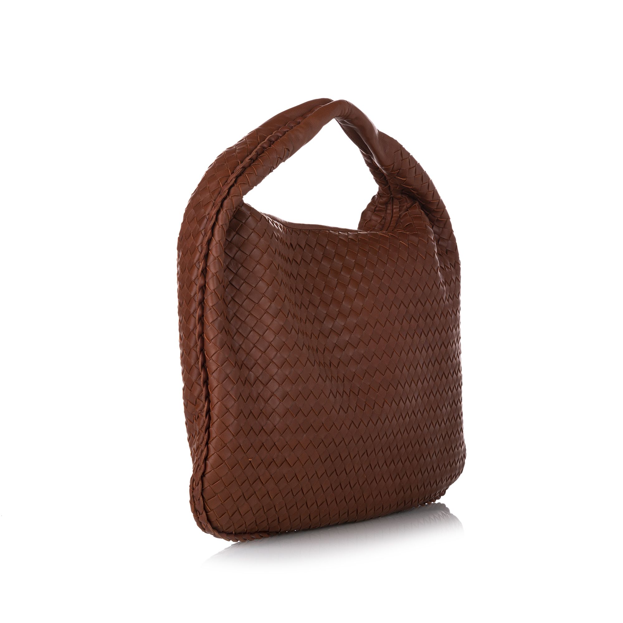 VINTAGE. RRP AS NEW. The Intrecciato hobo bag features a woven leather body, a flat strap, a top zip closure, and an interior zip pocket.

Dimensions:
Length 30cm
Width 46cm
Depth 3cm
Hand Drop 8cm

Original Accessories: Dust Bag, Dust Bag, Authenticity Card

Serial Number: 115654 V0013 6308 EPEV 2008 5952 A
Color: Brown
Material: Leather x Calf
Country of Origin: Italy
Boutique Reference: SSU154992K1342


Product Rating: GoodCondition

Certificate of Authenticity is available upon request with no extra fee required. Please contact our customer service team.