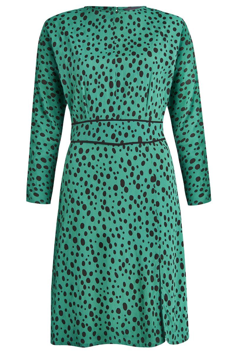 REASONS TO BUY: 

Spots are always in style 
A shade to stand out in 
Fluid fabric flatteringly drapes over your figure 
Waist panels to accentuate your middle 
Front splits for added sexiness 
Wear it with courts for work, ankle boots at the weekend  