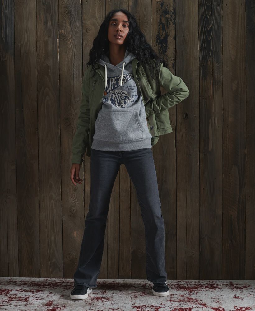 Inspired by athleisure attire, the Track & Field classic hoodie is perfect for layering up to provide you with an extra layer of warmth this season with a super-soft fleece lining.Slim fit – designed to fit closer to the body for a more tailored lookDrawstring hoodLong sleevesRibbed cuffs and hemFleece liningCrack effect detailingSuperdry logo graphicSignature logo tab