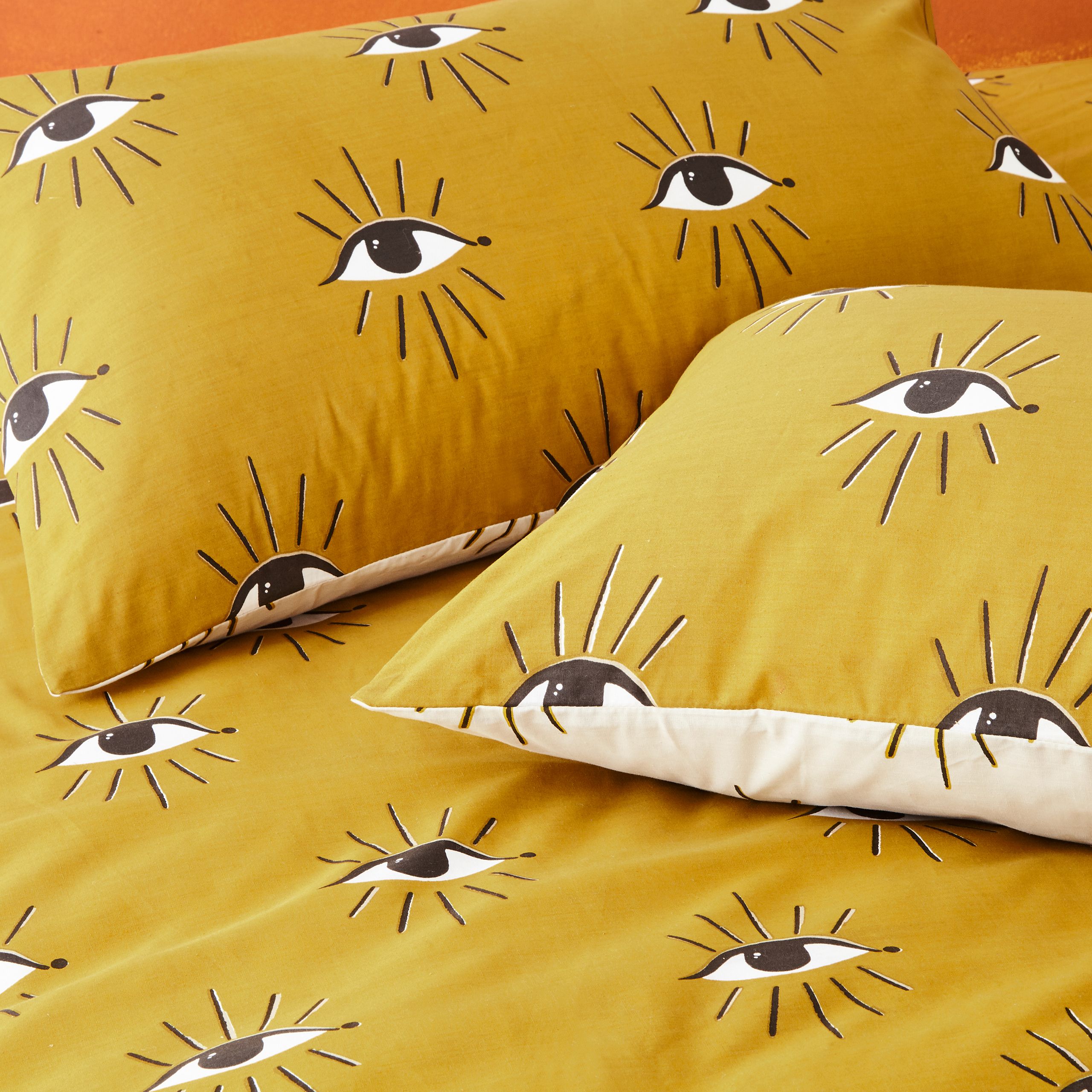 Add instant personality into your bedroom with this bold duvet set, featuring mystical watching eyes design. This has a neutral reversible design so you can switch the look when you need to.