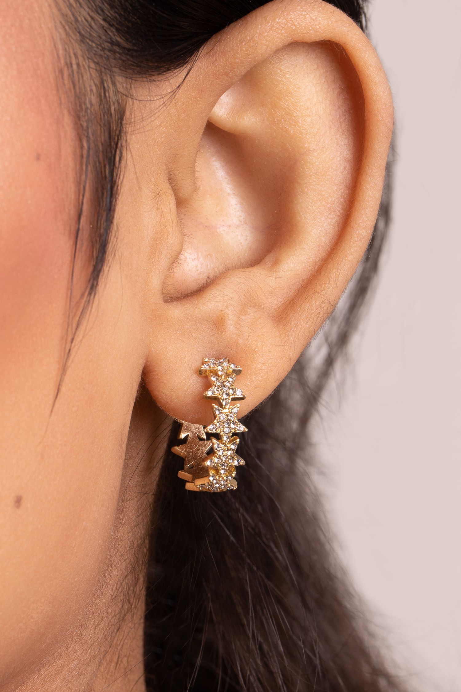 Unleash the twinkling star in you attracting attention with a subtle, yet sparkling style that can't be missed. Dazzle into the new season with these gold plated sparkly star earrings that are perfect for everyday wear for any occasion! The delicate gold tone earrings feature beautiful pave stars with a depth of 20mm. Presented in a KTx jewellery pouch to keep your jewellery safe or ideal for gifting!
