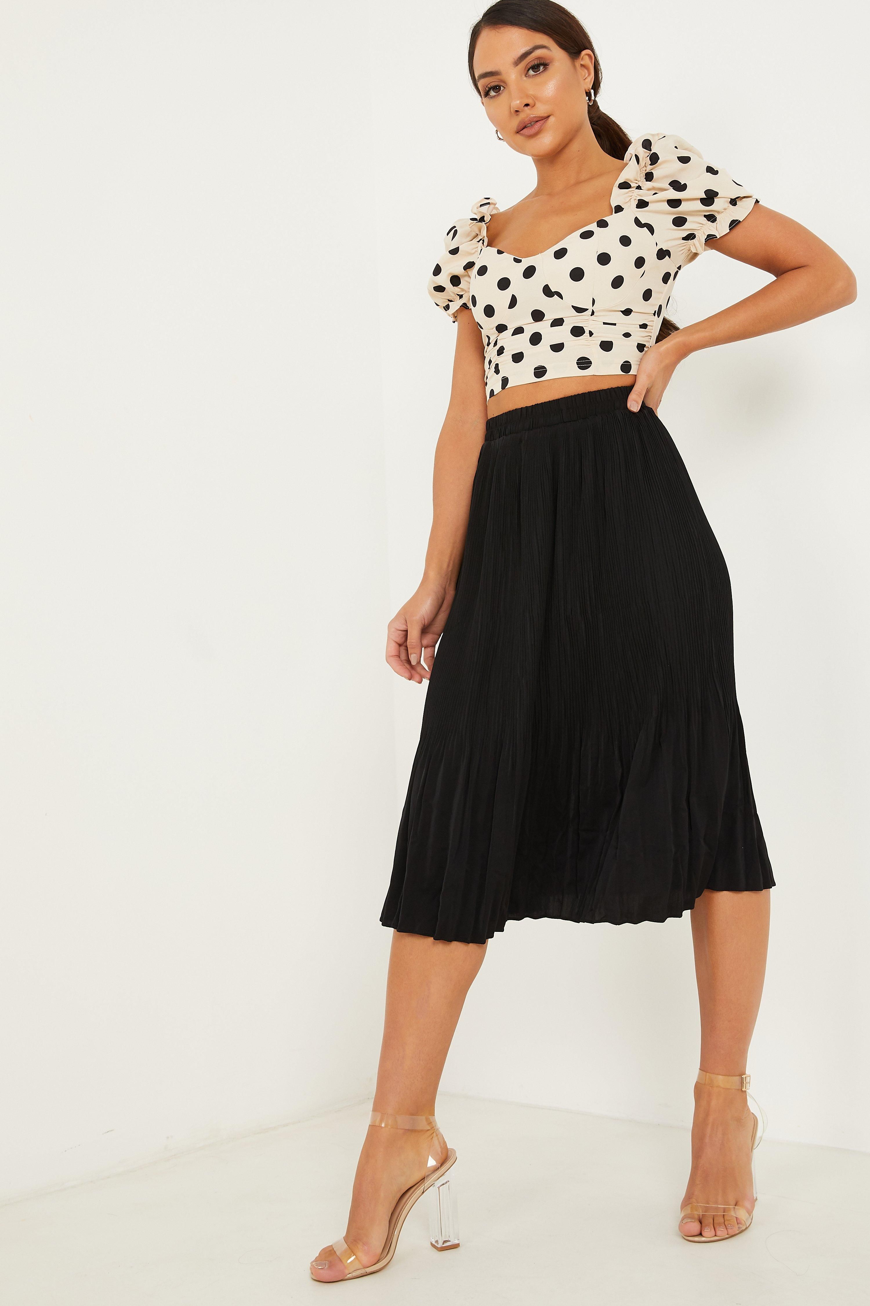 - Pleated skirt   - High waist  - Elasticated waistband  - Midi length  - Length: 78 cm approx  - Model height: 5' 7