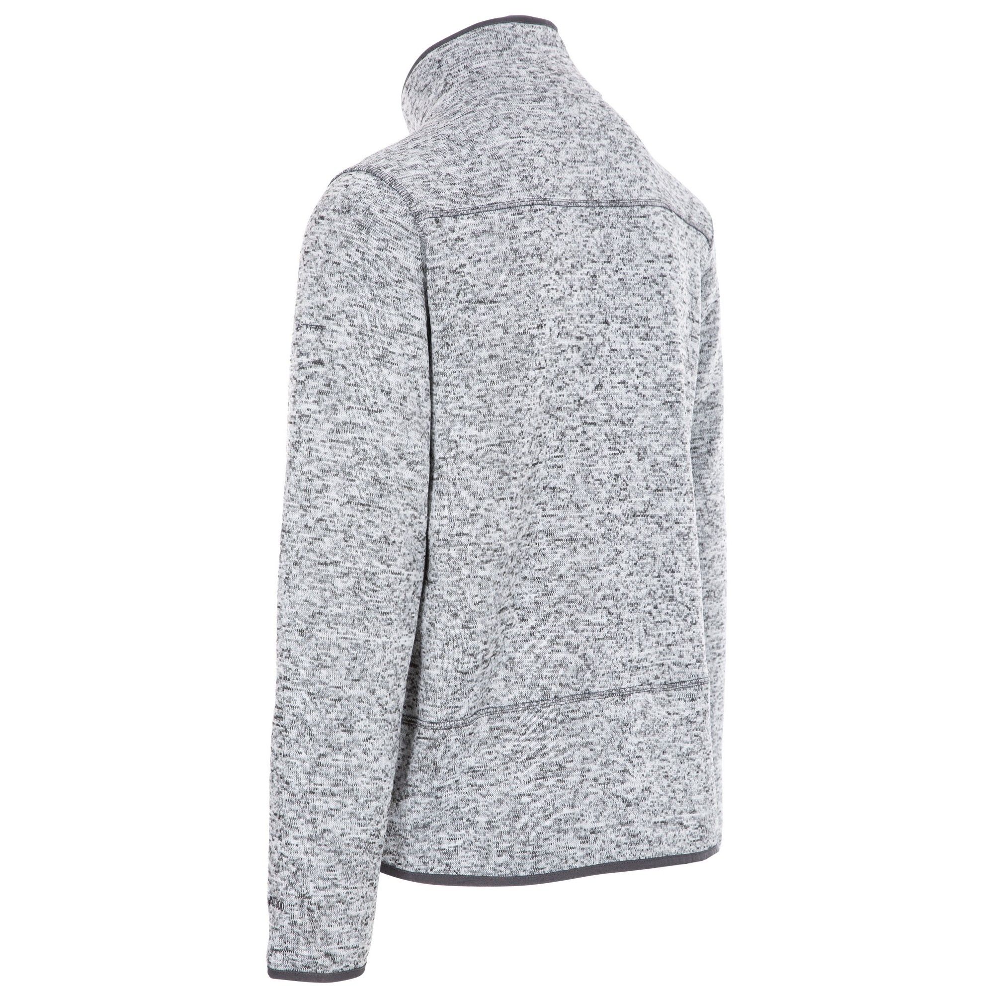 Knitted marl fleece. Brushed back. Chest pocket with printed surround detail. Coverstitch detail. 3 zip pockets. Stretch binding at cuffs and hem. 100% polyester.