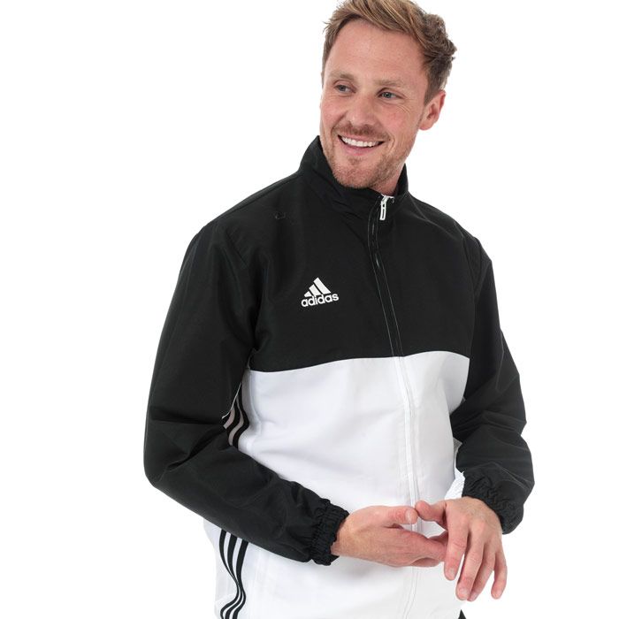 Mens adidas T16 Team Jacket in black - white.<BR><BR>- climalite fabric sweeps sweat away from your skin.<BR>- Stand up collar.<BR>- Full zip fastening.<BR>- Long sleeves with elasticated cuffs.<BR>- Zipped front welt pockets.<BR>- Elasticated hem.<BR>- Mesh lined back and upper sleeves.<BR>- Applied 3-Stripes to sides.<BR>- adidas Badge Of Sport logo printed at right chest.<BR>- Branded back neck tape.<BR>- Regular fit.<BR>- Main material: 100% Recycled polyester. Machine washable.<BR>- Ref: AJ5382