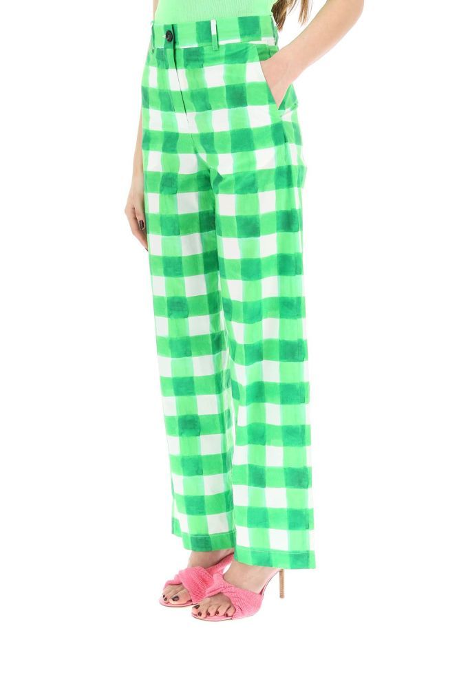 MSGM wide-leg trousers crafted in cotton poplin with all-over check print. They feature a concealed zip fastening with button on the front, high-waist with belt loops, two slash pockets and two rear welt pockets. Loose fit. The model is 177 cm tall and wears a size IT 38.