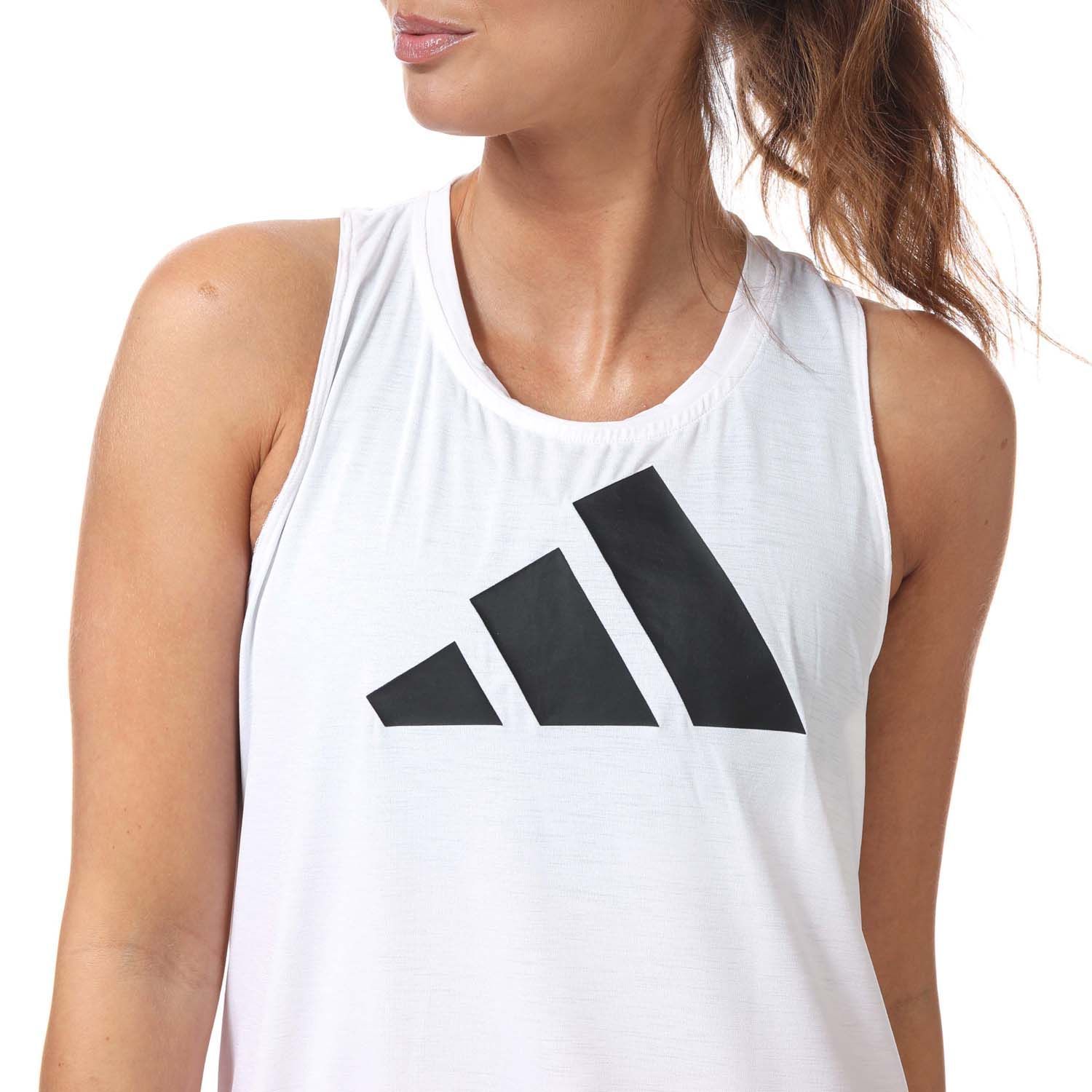 Womens adidas 3- Stripes Logo Tank Top in white black.- Crewneck.- Sleeveless.- Racerback with cutout.- Moisture absorbing.- Scoop hem.- Regular fit.- Main Material: 81% Polyester (Recycled)  19% Elastane.- Ref: GR8054