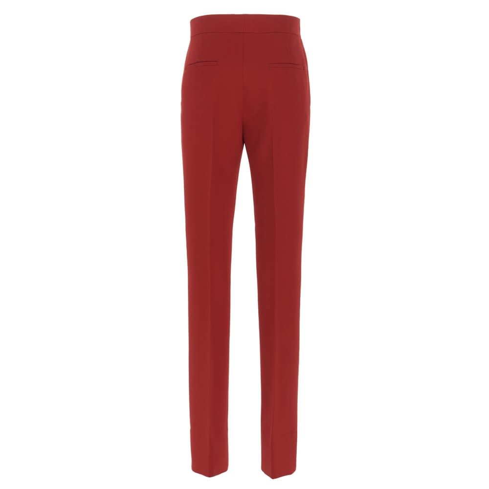 Givenchy high waist wool trousers with a zip, button and hook-and-eye fastening, tight leg, tapered.