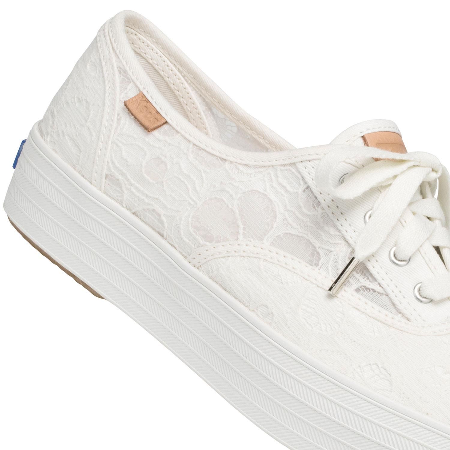 Keds Women's Triple CVO Festival Floral Sneaker with Rubber Outsole

Festival shoes: found. our triple platform sneakers in dainty eyelet are just the thing to add interest (and inches) to all your Coachella-inspired looks - denim cutoffs, crochet wraps, floral kimonos, flower crowns, etc.

Features: 
Textile upper
1