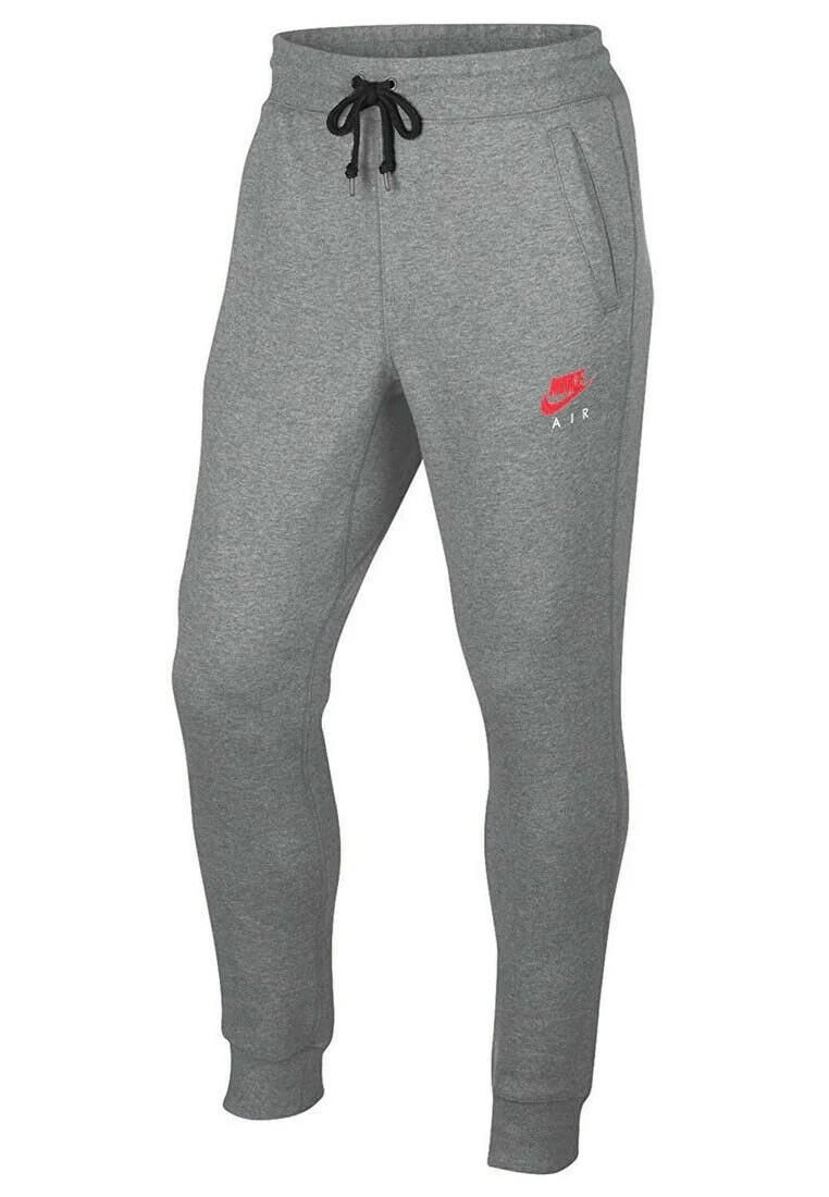 Nike Air Slim Fit Joggers Grey.     
Nike Air Logo Near Left Pocket.    
Two Side Pockets, Single Back Pocket.   
Soft-brushed Fleece Lined Fabric.    
Elasticated Waist With Drawstring.  
Elasticated Hems.