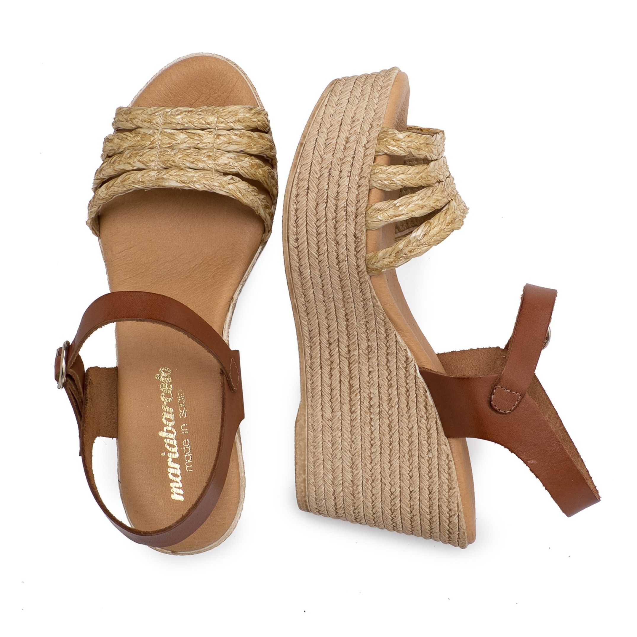 High Wedge sandals, by María Barceló Shoes. Upper: cowhide leather and textile. Closure: Metal buckle. Inner lining and insole: pig lining. Padded sole: 0,5 cm. Sole material: 100%, lightweight and non-slip. Heel height: 8'5 cm. Platform 3 cm. Designed and manufactured in Spain.