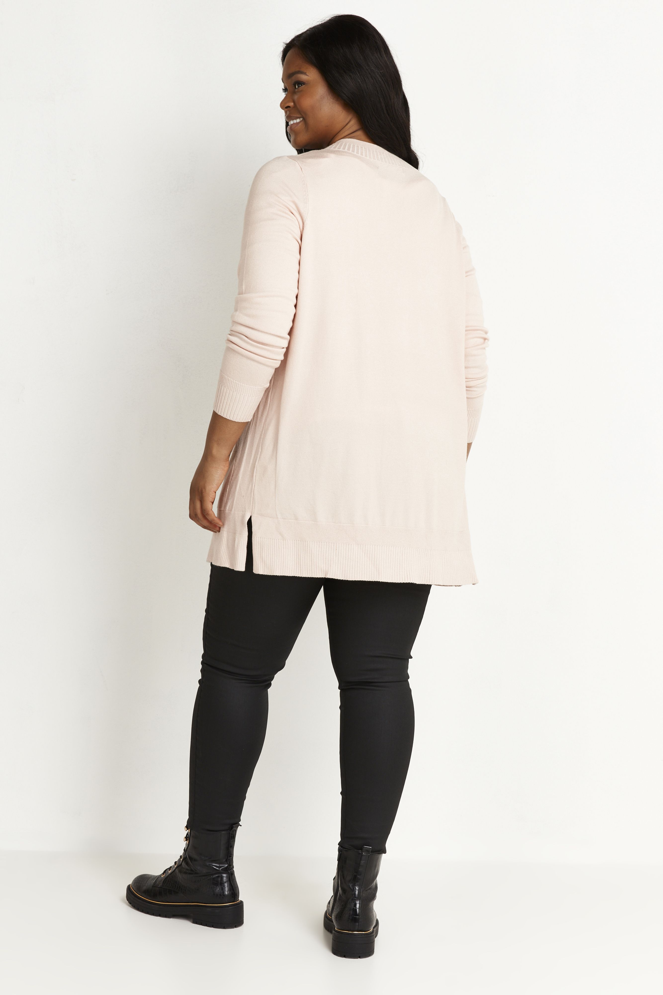 Cute, cosy and simple, the Fine Knit Cardigan is a go-to staple for crisp days. A timeless addition to your knitwear collection, the sweet pink hue brings a touch of femininity and soft colour. Key Features Include: - Open collarless neckline - Long sleeves - Stretch knit fabrication - Relaxed fit - Hip length Running the errands? Throw over your tee and jeans for easy styling. Just finish with a pair of fresh white trainers and you're good to go!