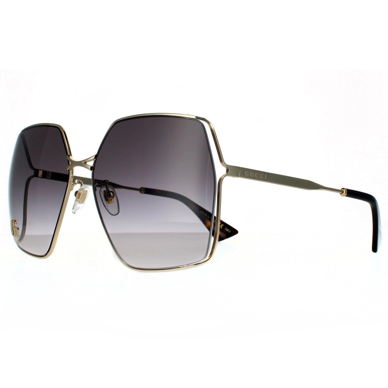 Gucci Square Womens Gold  Grey Gradient  Sunglasses Gucci are a lightweight and minimal oversized design with a metal frame. One of the large lenses features a metal interlocking GG logo and slim temples are engraved with the text Gucci logo.
