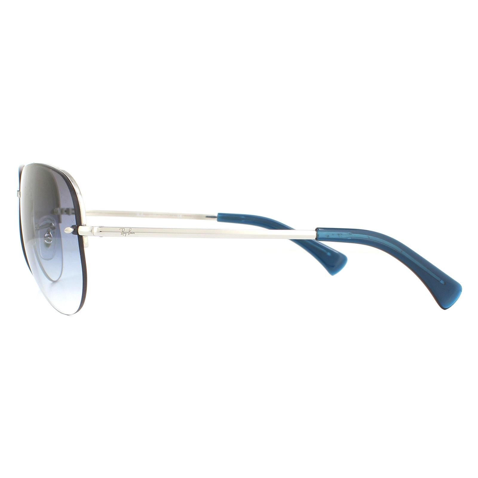 Ray-Ban Sunglasses RB3449 91290S Silver Clear Blue Grey Gradient  are a classic aviator shape but with a rimless lens that give them a modern contemporary twist that is quite brilliant