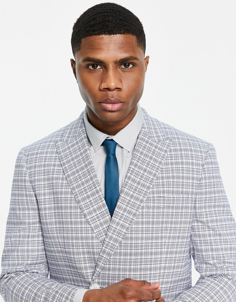 Suit jacket by Topman Do the smart thing Check design Peak lapels Padded shoulders Double-breasted style Two-button fastening Pocket details Skinny fit Sold by Asos
