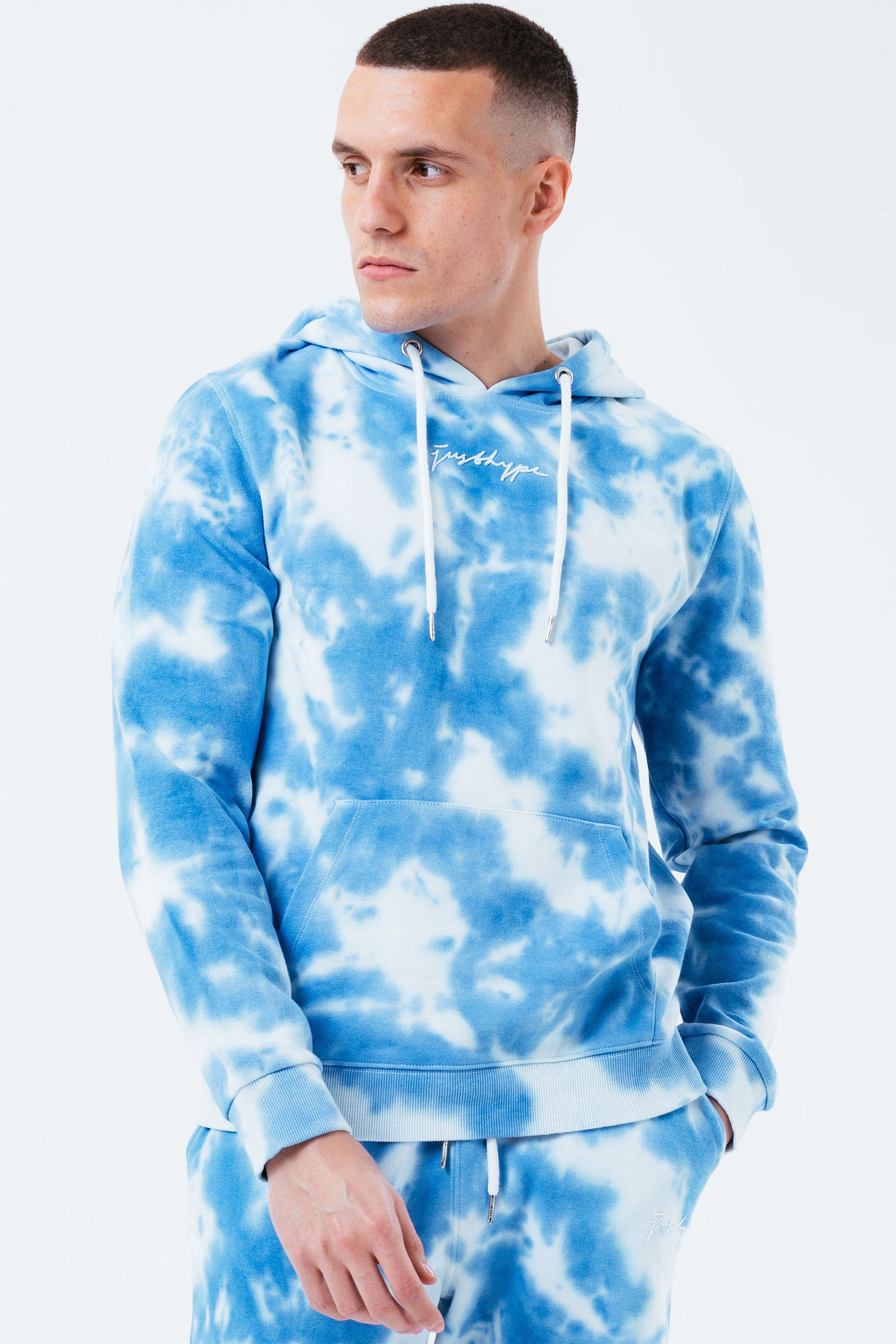 Stay on trend with the Hype Navy Tie Dye Scribble Logo Men's Pullover Hoodie and grab the matching joggers to complete the set. Designed in a 70% Cotton 30% Polyester soft-touch fabric with the supreme amount of comfort you need from your new pullover. Finished with fitted hem and cuffs, kangaroo pocket and hood. Machine wash at 30 degrees.