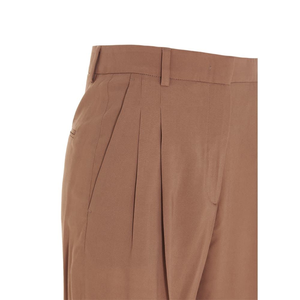 Alberto Biani stretch viscose georgette trousers, with darts, zip, hook and button fly and slang pocket.