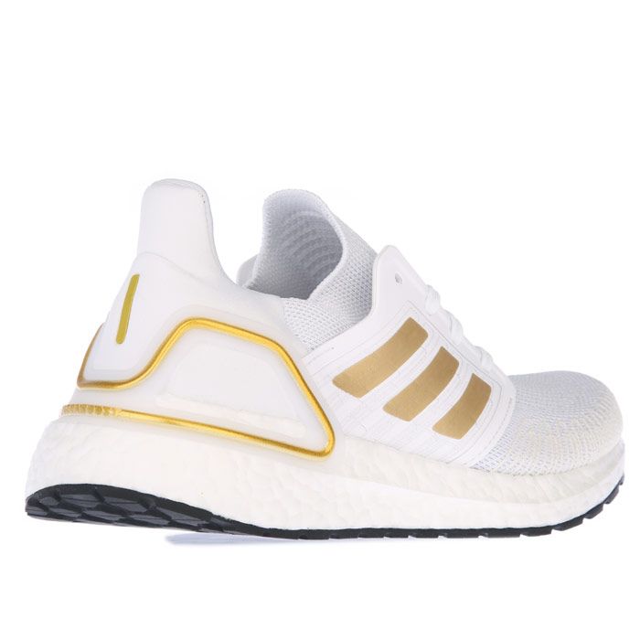 Womens adidas Ultraboost 20 Running Shoes in white gold.- adidas Primeknit+ textile upper.- Lace closure.- Snug  sock-like fit.- Tailored Fibre Placement locked-in fit.- Responsive Boost midsole.- Stretchweb outsole with Continental™ Rubber.- Textile upper  Textile lining  Stretchweb sole.- Ref.: EG0727