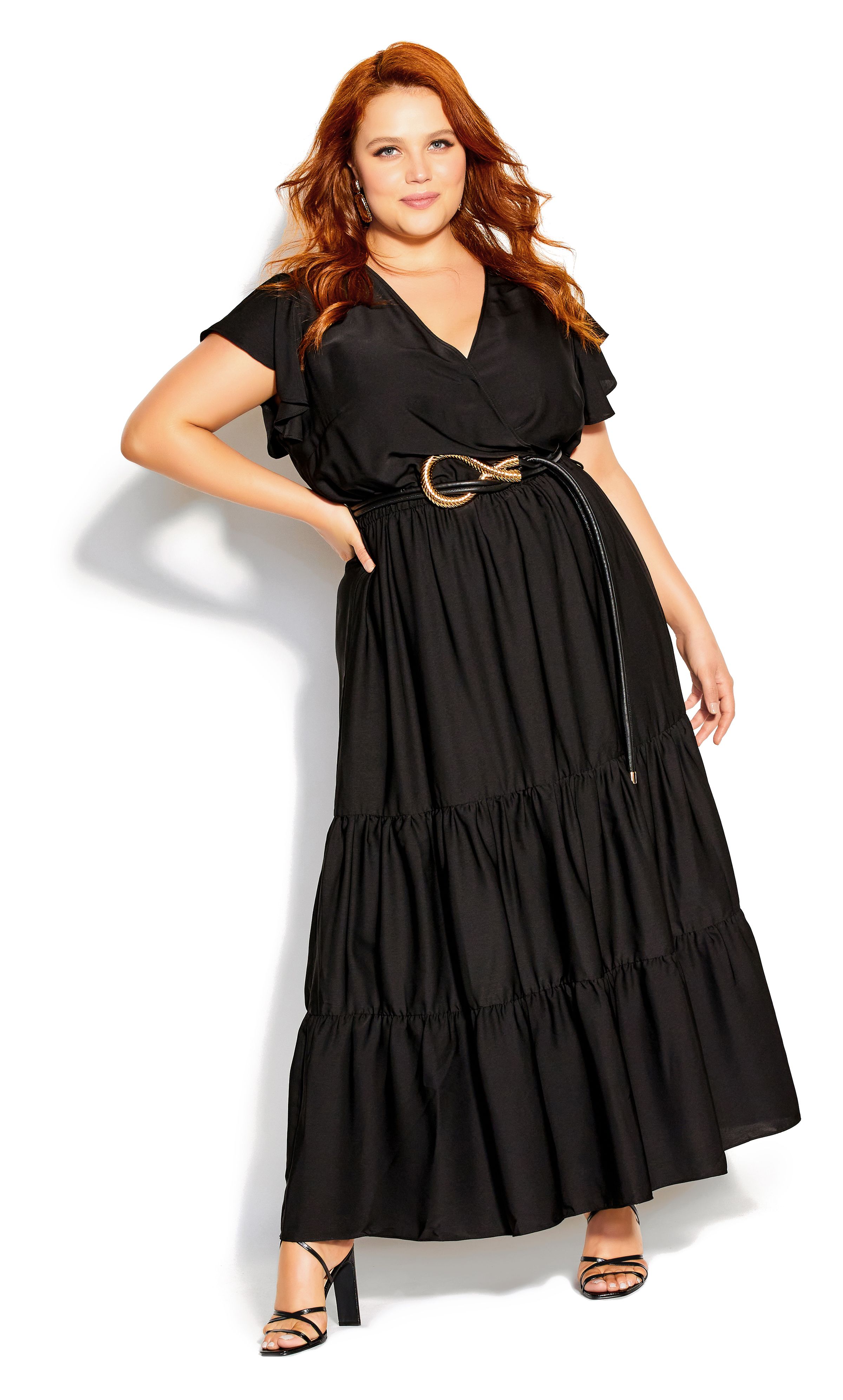Float into the new season with the Flutter Away Maxi Dress, boasting a feminine silhouette and ruffle tiered skirt. Finished in a flattering faux wrap neckline and elegant tie waist, this draping maxi dress is one graceful ensemble. Key Features Include: - V-neckline - Frilled short sleeves - Elasticated waistband - Removable self-tie waist belt - Faux wrap style - Tiered skirt - Pullover style - Unlined - Maxi length
