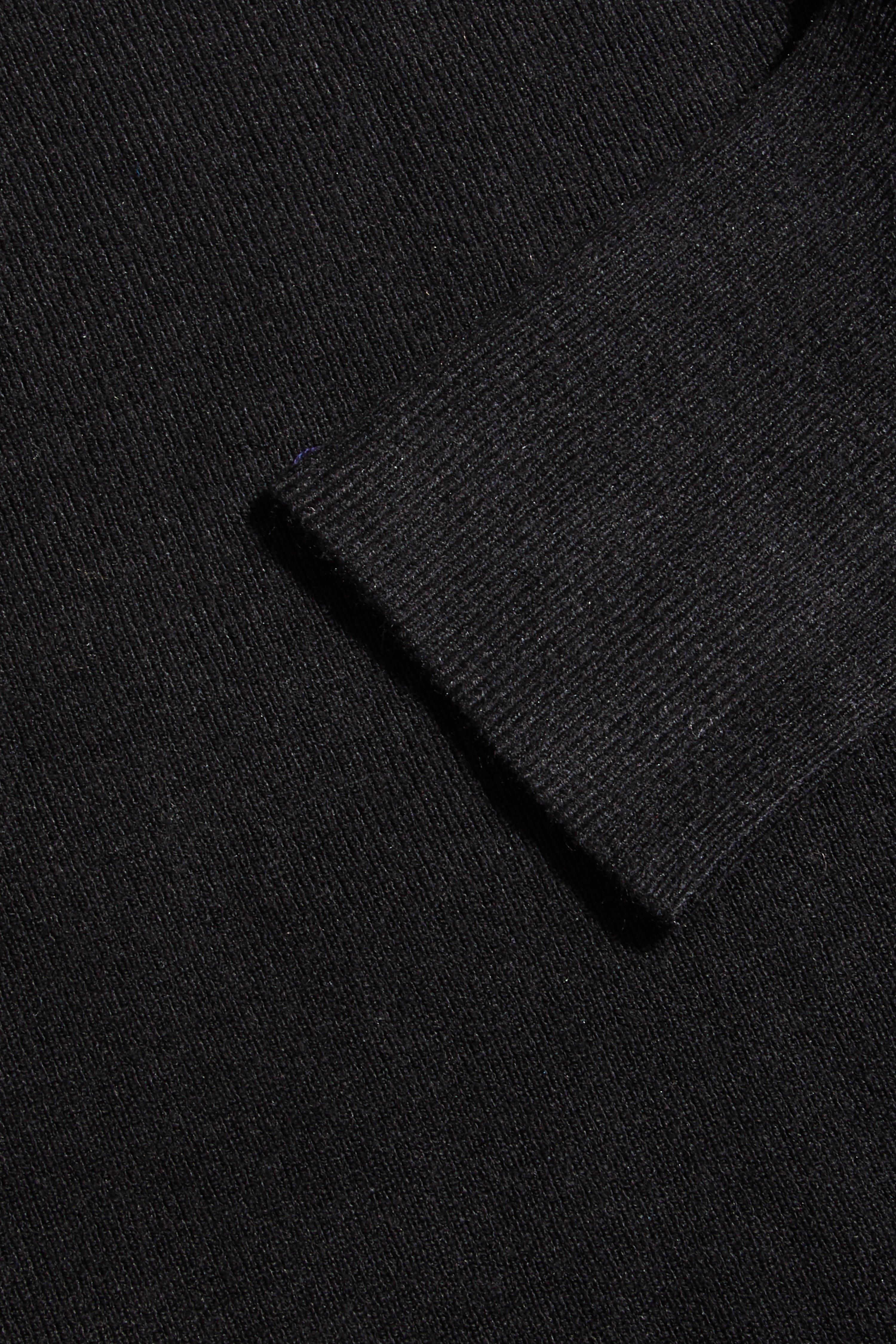 - Knitted jumper  - Fringe sleeve  - High neck  - Mesh detail  - Length: 65cm approx