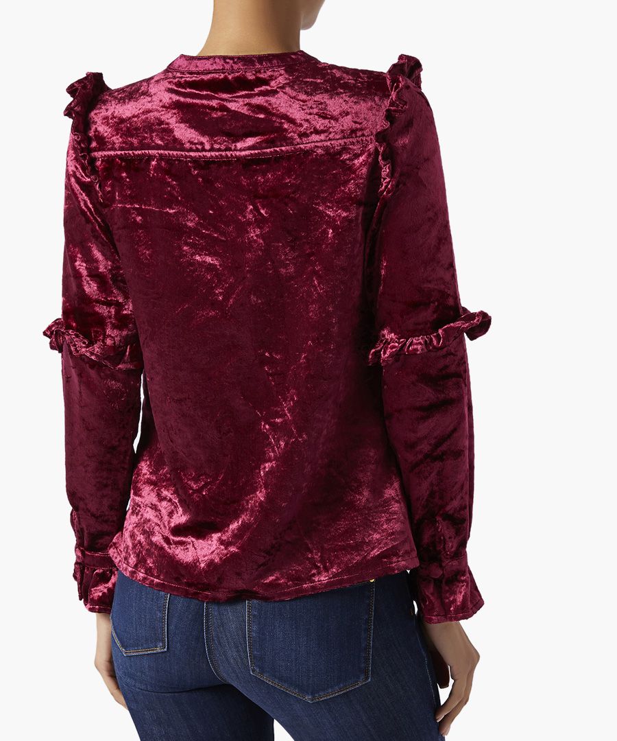 Monsoon Viola bright maroon velvet blouse

What once began among the stalls of Portobello Road has since burst onto the international scene, while sticking to their Bohemian and ethically sourced roots.