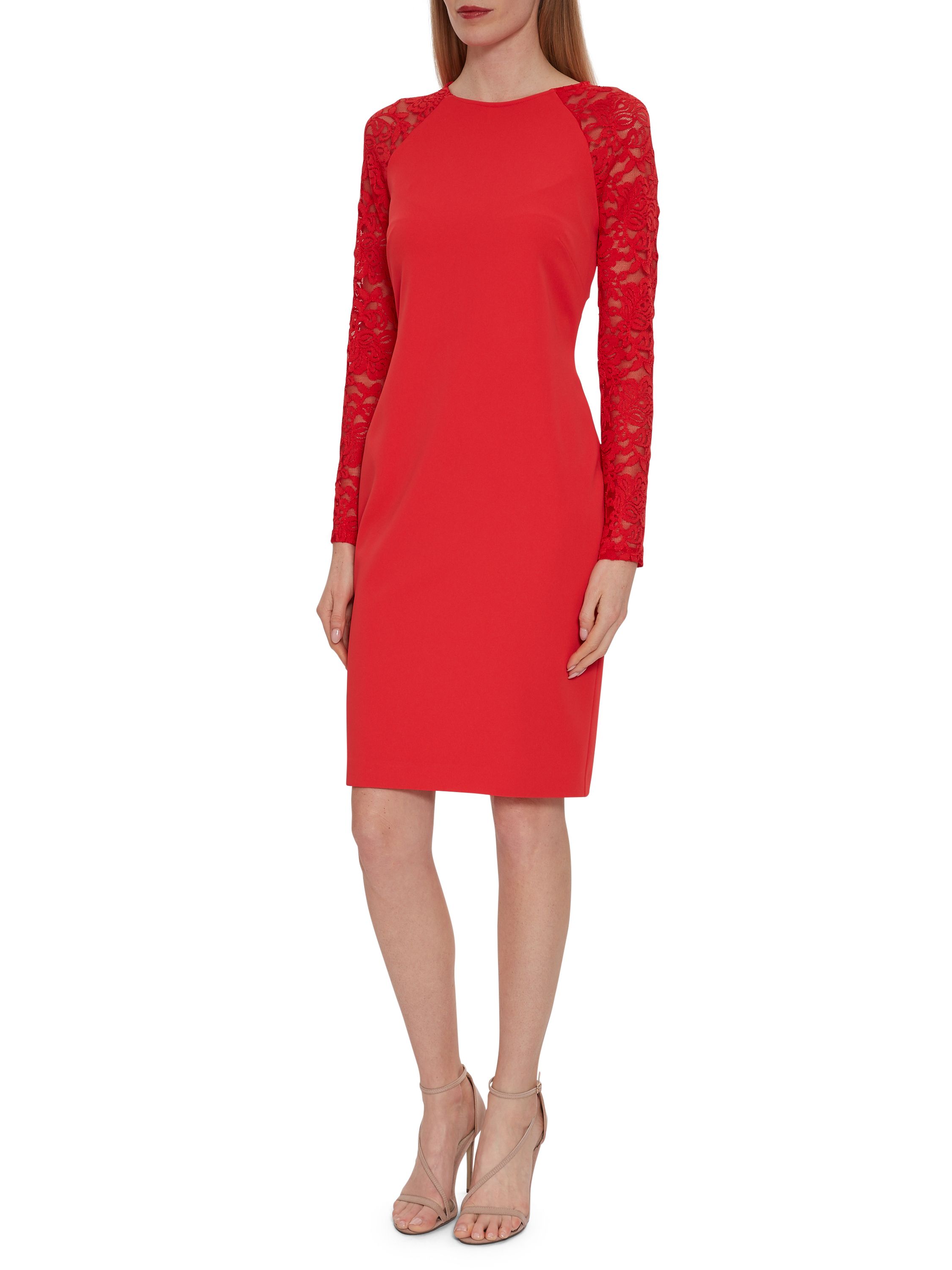 Gina Bacconi presents its stunning crepe and lace dress. This perfect occasionwear piece is comprised of a classic shift dress with sheer dainty floral lace sleeves. This beautiful dress is perfect for a summer party or special occasion. The dress is part