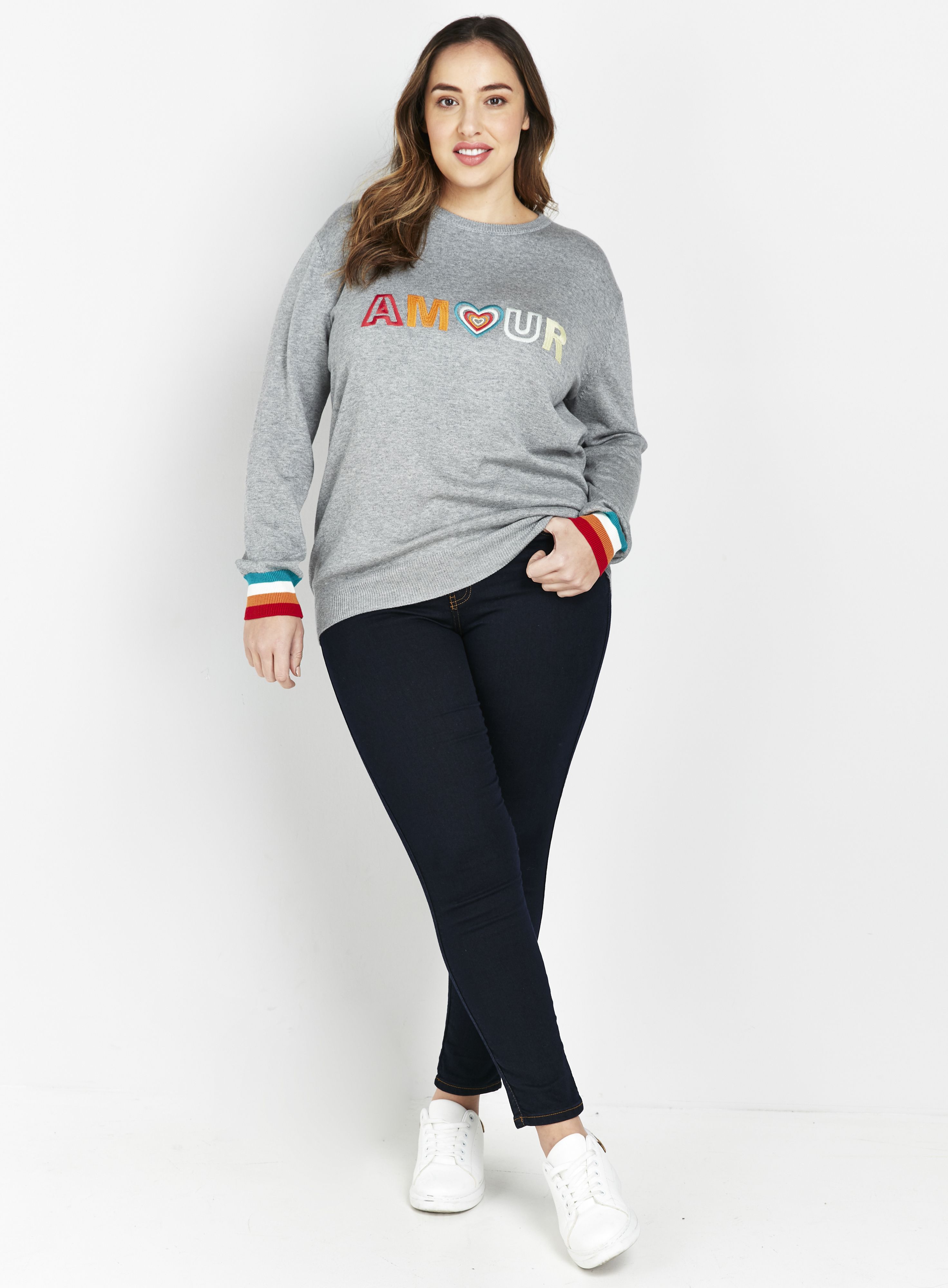 This cute slogan jumper will add a pop of colour to your everyday wardrobe. Rainbow detailing and a cute heart design keep this contemporary, whilst a relaxed fit and laid-back grey hue will have you wearing this on-repeat. Wear with jeans and chunky ankle boots, layering over a padded coat for cosy winter walks.  Jumper Round neck Long sleeve Relaxed Casual 56% Acrylic, 44% Cotton Machine washable